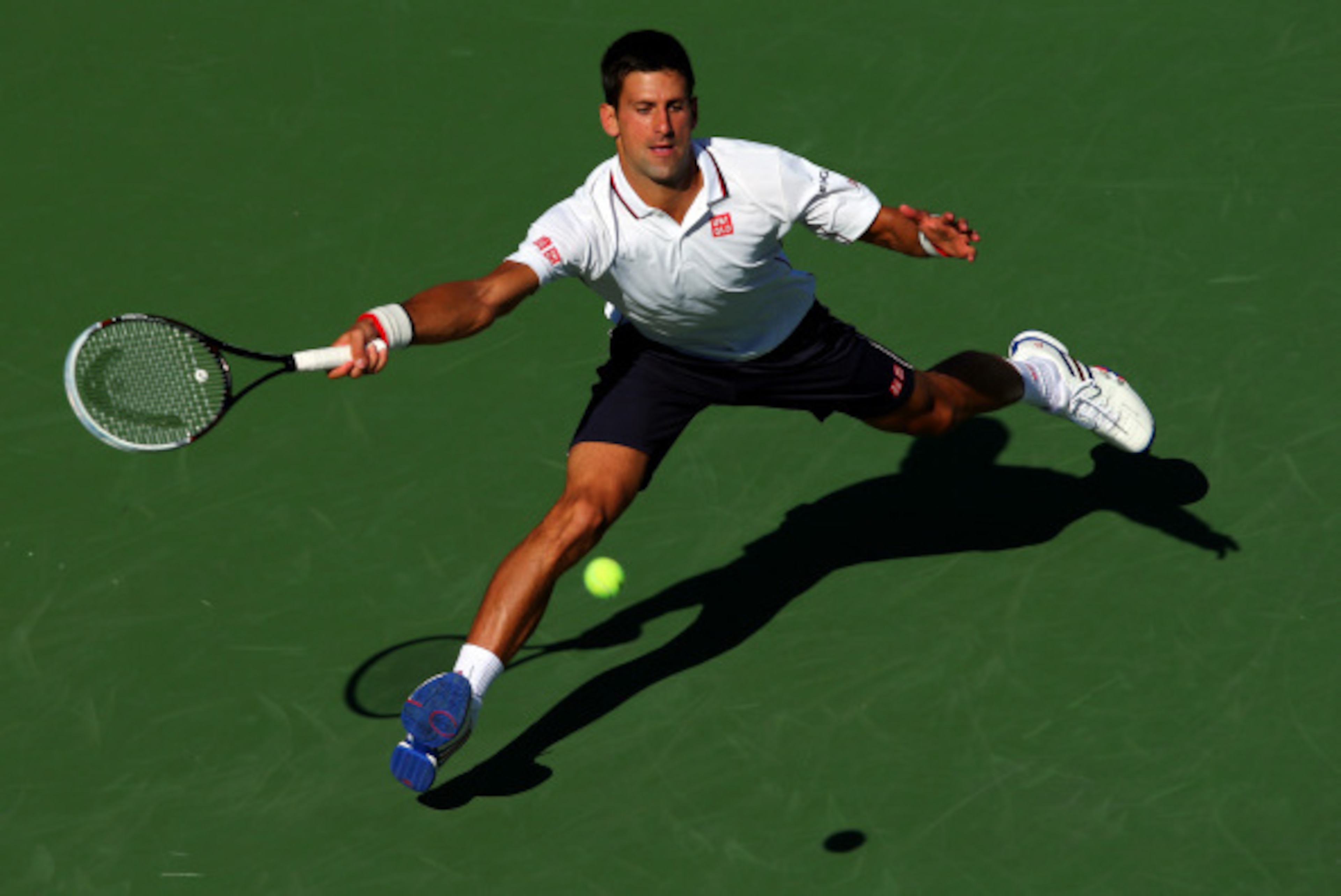 NEW YORK, NY - AUGUST 28: Novak Djokovic of Serbia returns a shot against Paul-Henri Mathieu of France during their men's second round match on Day Four of the 2014 US Open at the USTA Billie Jean King National Tennis Center on August 28, 2014 in the Flu NEW YORK, NY - AUGUST 28: Novak Djokovic of Serbia returns a shot against Paul-Henri Mathieu of France during their men's second round match on Day Four of the 2014 US Open at the USTA Billie Jean King National Tennis Center on August 28, 2014 in the Flu