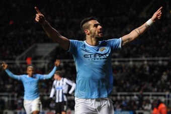 NEWCASTLE UPON TYNE, ENGLAND - JANUARY 12:  Manchester City striker Alvaro Negredo celebrates after scoring the second goal during the Barclays Premier League match between Newcastle United and Manchester City at St James' Park on January 12, 2014 in Newc