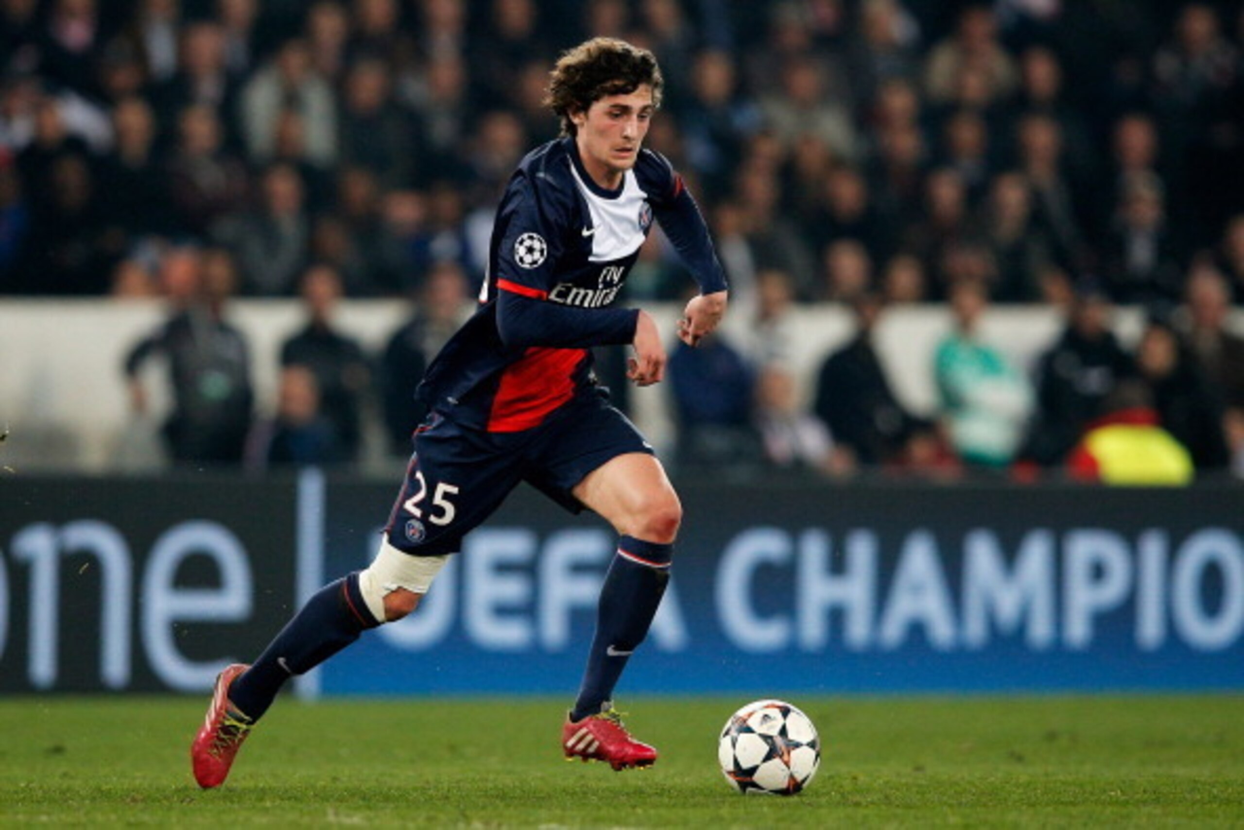 PARIS, FRANCE - MARCH 12:  Adrien Rabiot of PSG in action during the UEFA Champions League Round of 16 second leg match between Paris Saint-Germain FC and Bayer Leverkusen at Parc des Princes on March 12, 2014 in Paris, France.  (Photo by Dean Mouhtaropou