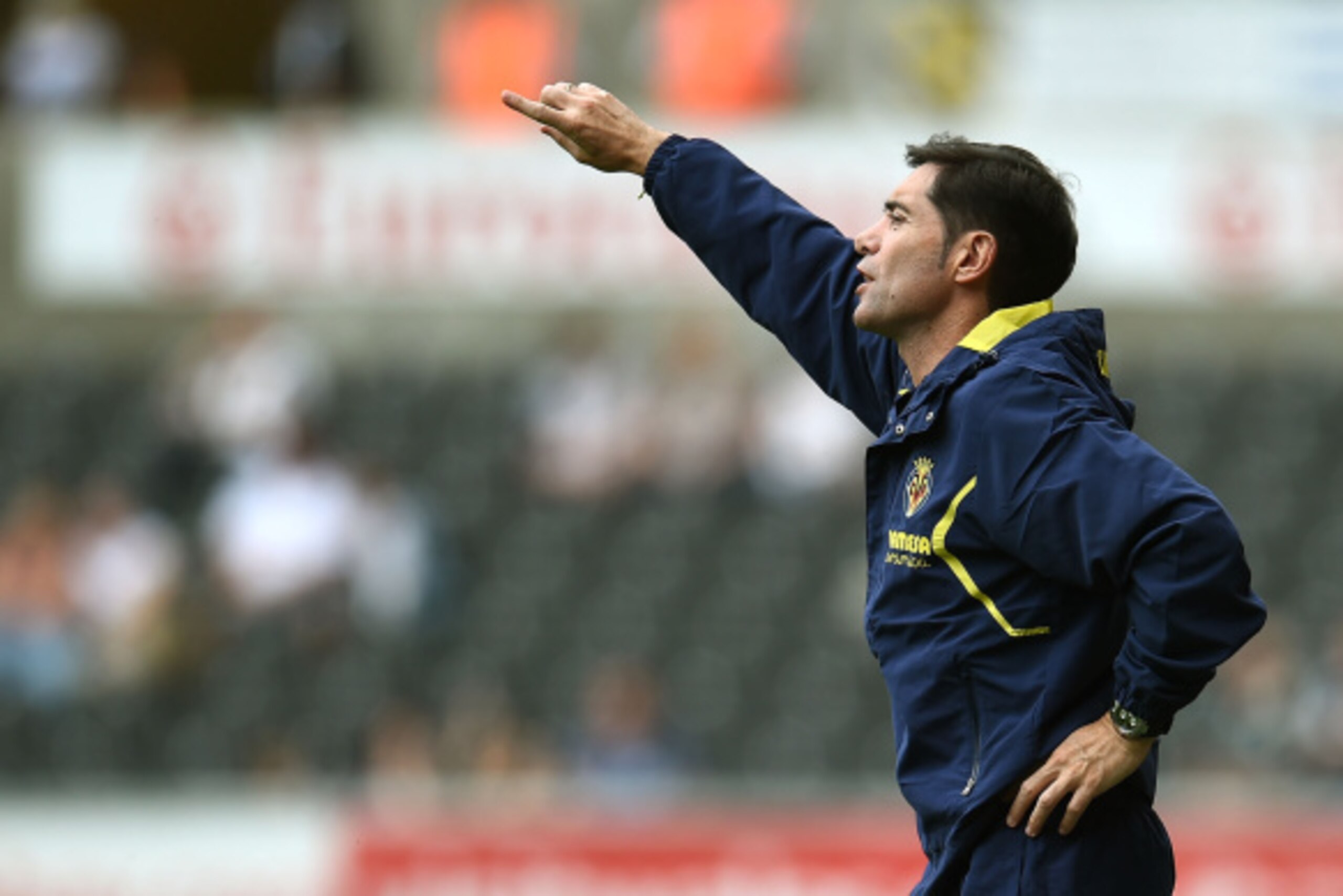 SWANSEA, WALES - AUGUST 09: Manager of Villarreal Marcelino Garcia Toral gives instructions during a pre season friendly match between Swansea City and Villarreal at Liberty Stadium on August 09, 2014 in Swansea, Wales. (Photo by Tom Dulat/Getty Images)