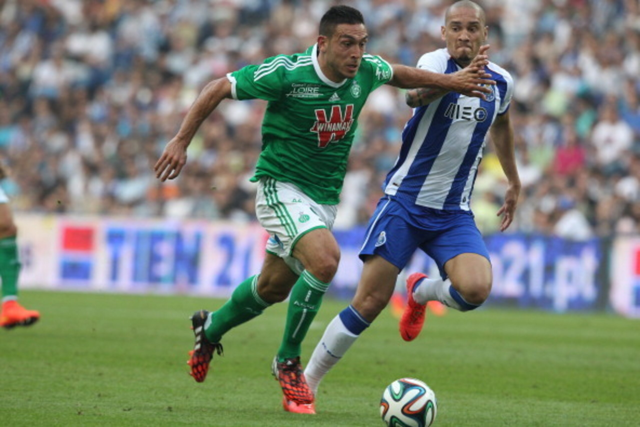 PORTO, PORTUGAL - JULY 27: Erding Mevlut of Saint-Etienne tries to pass trough Porto's Brazilian defender Maicon during a preseason friendly match between FC Porto and Saint-Etienne on July 27, 2014 in Porto, Portugal. (Photo by Carlos Rodrigues/Getty I PORTO, PORTUGAL - JULY 27: Erding Mevlut of Saint-Etienne tries to pass trough Porto's Brazilian defender Maicon during a preseason friendly match between FC Porto and Saint-Etienne on July 27, 2014 in Porto, Portugal. (Photo by Carlos Rodrigues/Getty I