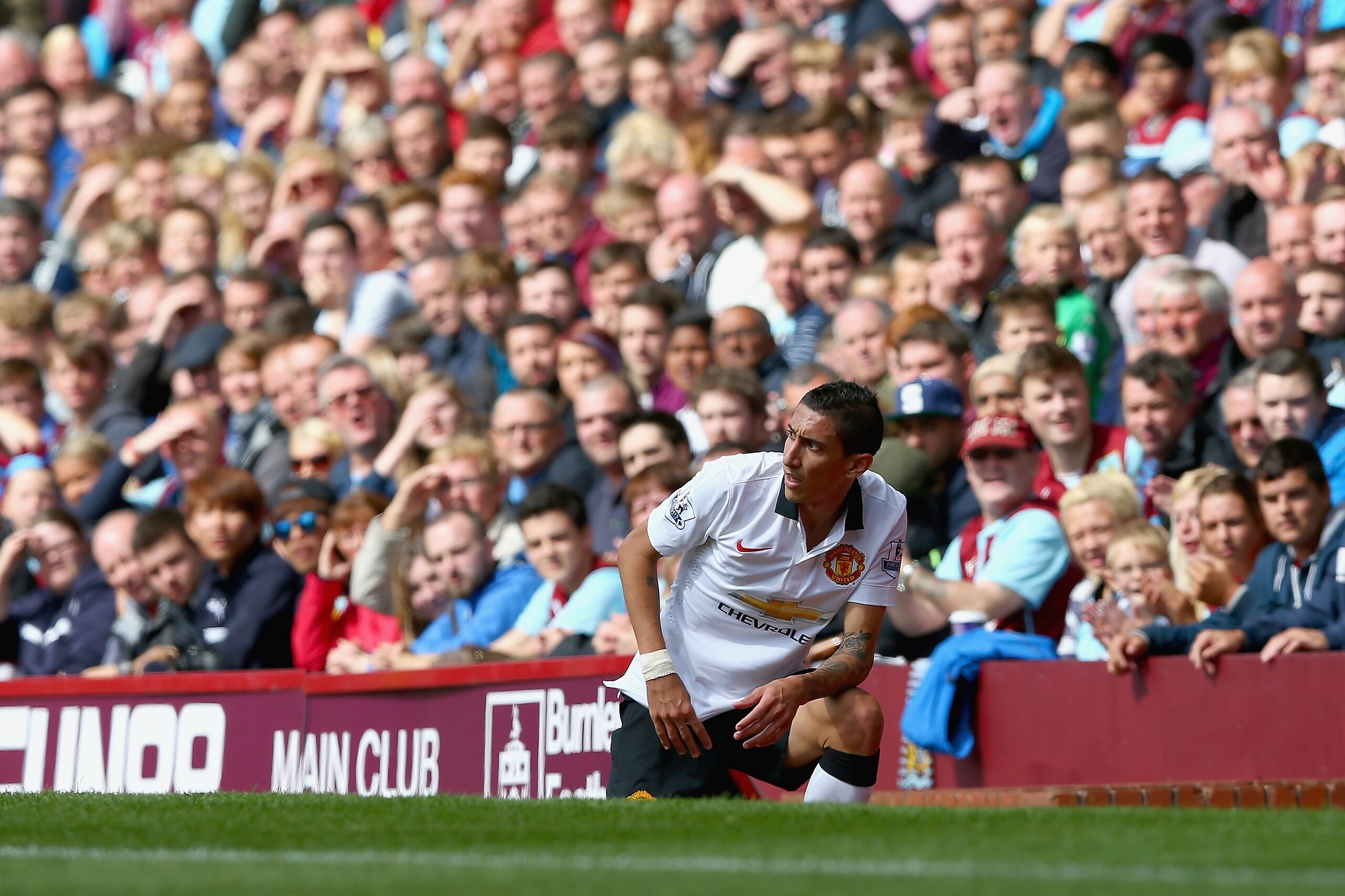 BURNLEY, ENGLAND - AUGUST 30:  Angel di Maria of Manchester United reacts after being fouled during the Barclays Premier League match between Burnley and Manchester United at Turf Moor on August 30, 2014 in Burnley, England.  (Photo by Clive Brunskill/Get