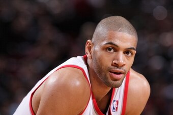 PORTLAND, OR - JANUARY 28:  Nicolas Batum #88 of the Portland Trail Blazers looks on during the game against the Memphis Grizzlies on January 28, 2014 at the Moda Center Arena in Portland, Oregon. NOTE TO USER: User expressly acknowledges and agrees that,