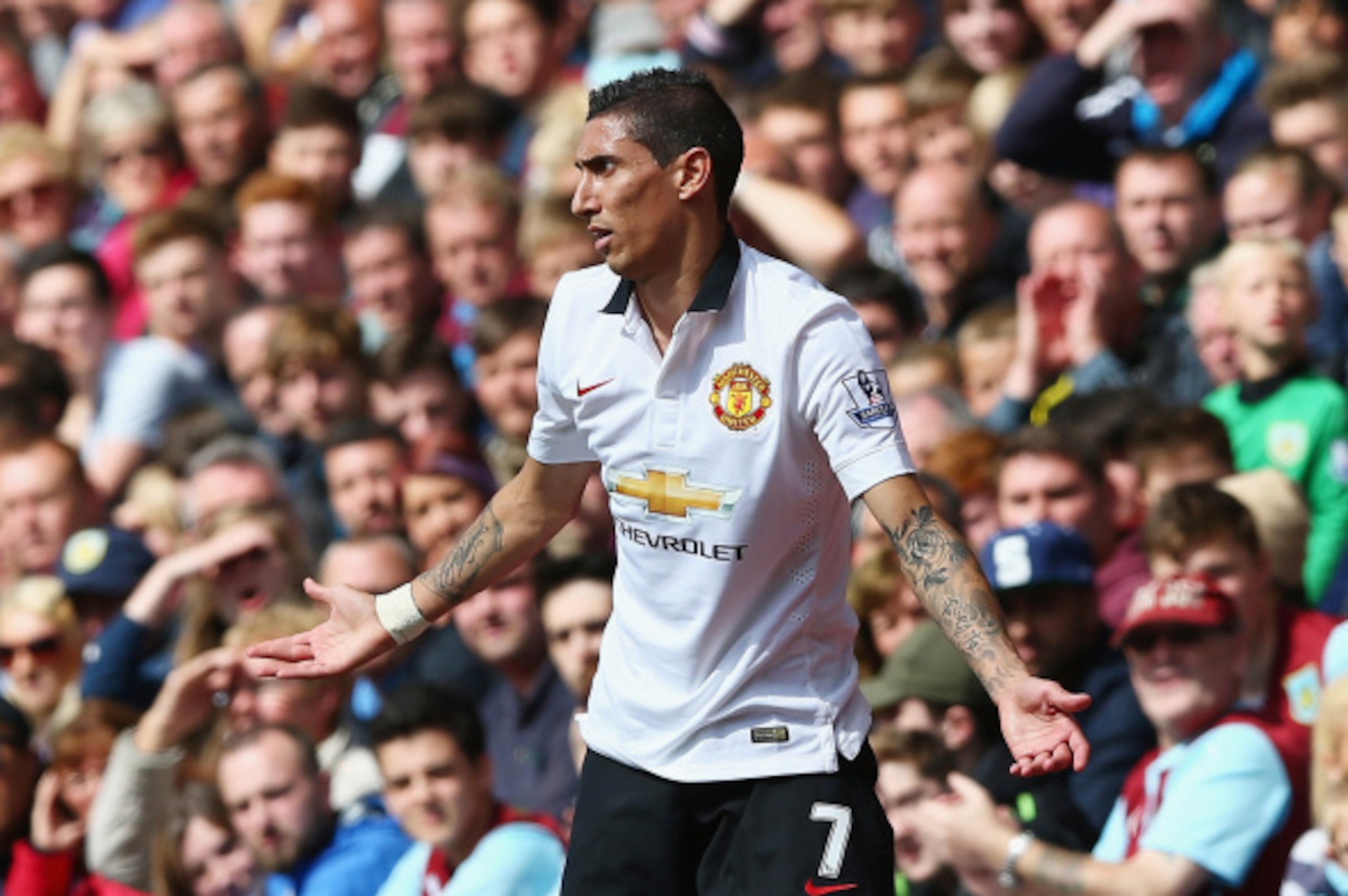 BURNLEY, ENGLAND - AUGUST 30:  Angel di Maria of Manchester United reacts after being fouled during the Barclays Premier League match between Burnley and Manchester United at Turf Moor on August 30, 2014 in Burnley, England.  (Photo by Clive Brunskill/Get