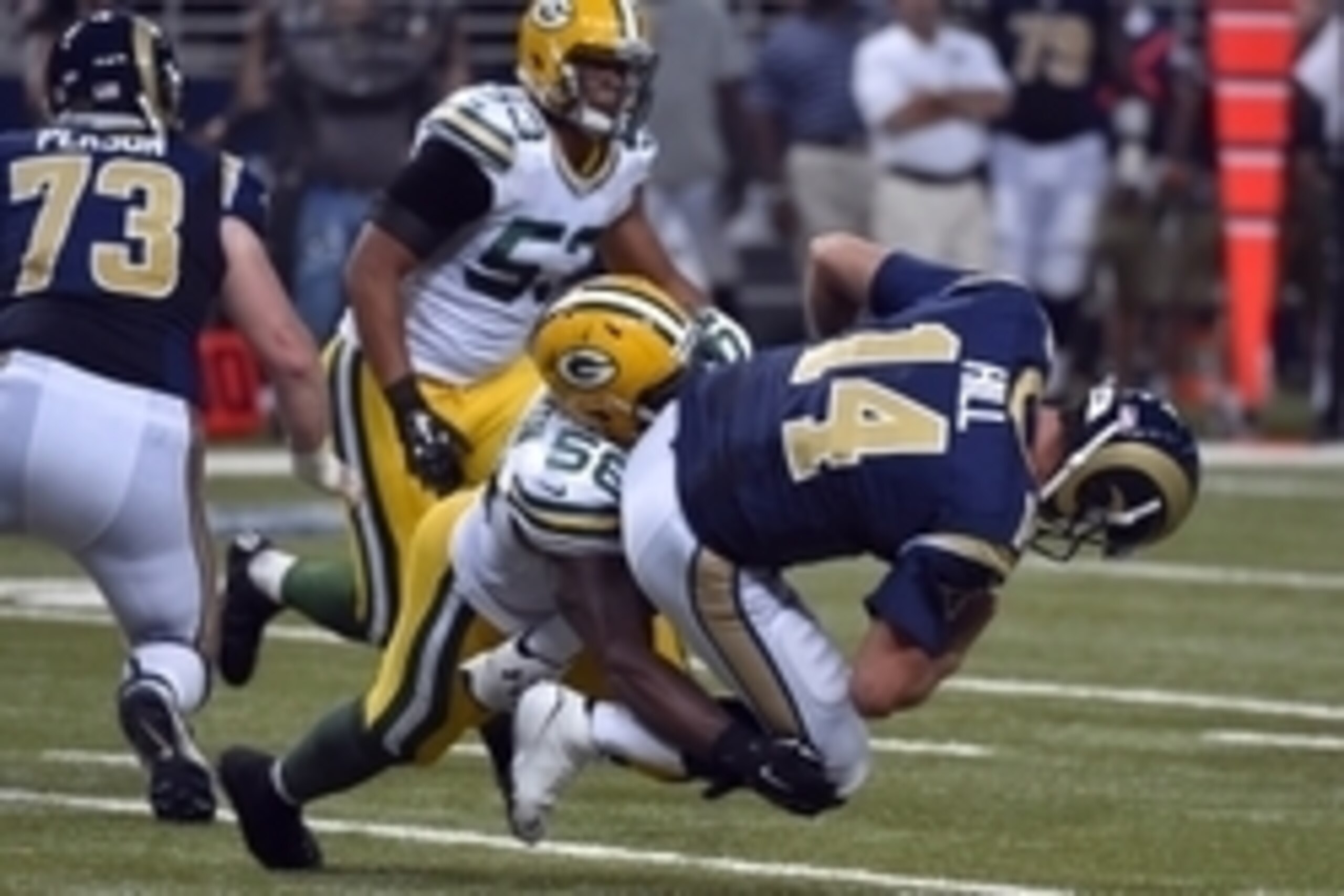 Aug 16, 2014; St. Louis, MO, USA; Green Bay Packers linebacker Sam Barrington (58) sacks St. Louis Rams quarterback Shaun Hill (14) during the second half at Edward Jones Dome. Mandatory Credit: Jasen Vinlove-USA TODAY Sports