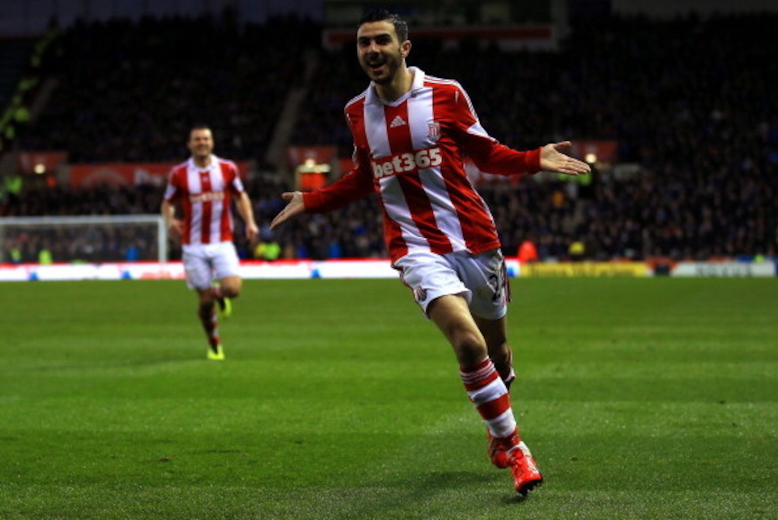 STOKE ON TRENT, ENGLAND - JANUARY 01:  Oussama Assaidi of Stoke City celebrates scoring the opening goal during the Barclays Premier League match between Stoke City and Everton at Britannia Stadium on January 1, 2014 in Stoke on Trent, England.  (Photo by