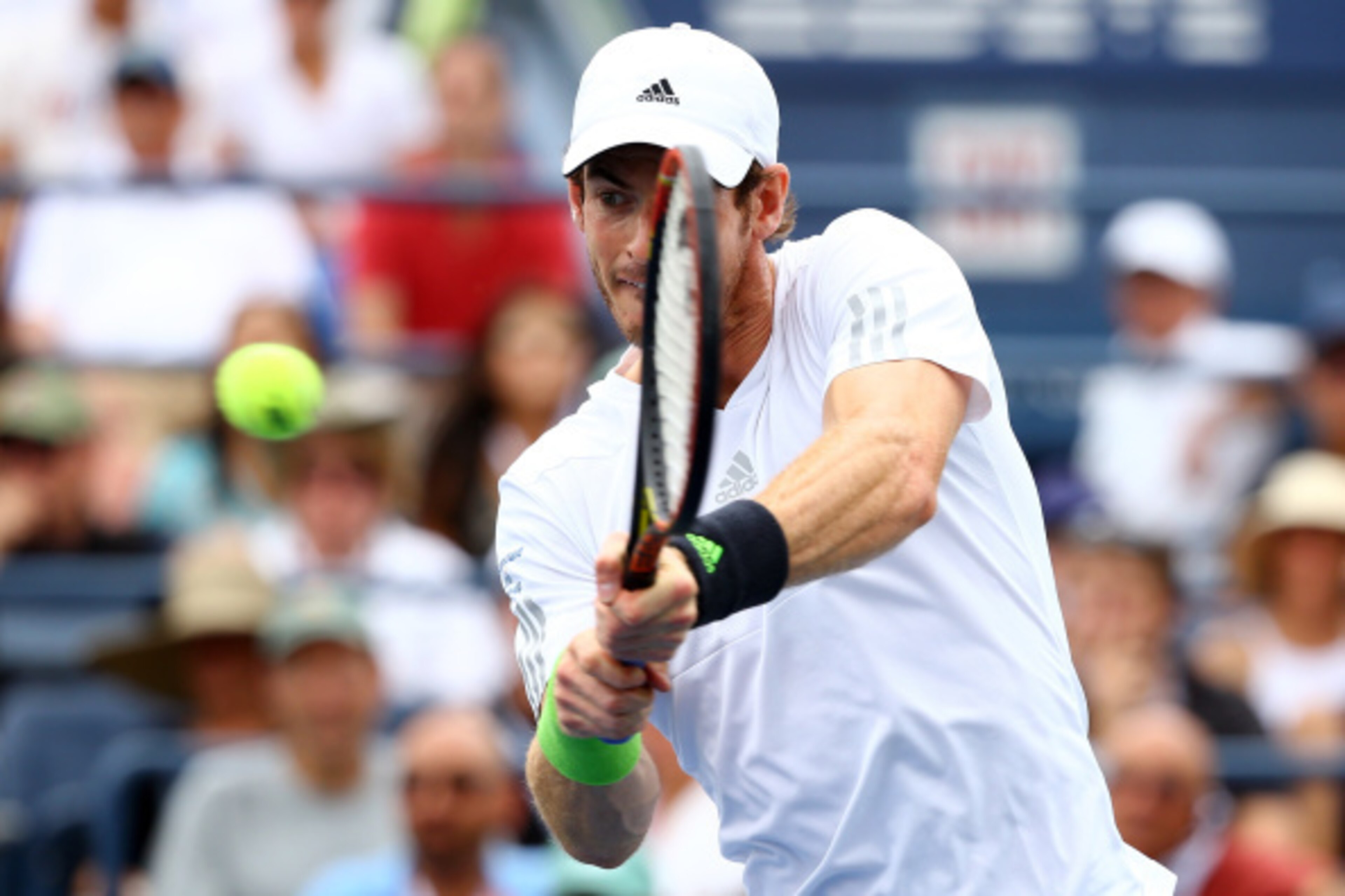 NEW YORK, NY - AUGUST 30:  Andy Murray of Great Britain returns a shot against Andrey Kuznetsov of Russia during their men's singles third round match on Day Six of the 2014 US Open at the USTA Billie Jean King National Tennis Center on August 30, 2014 in