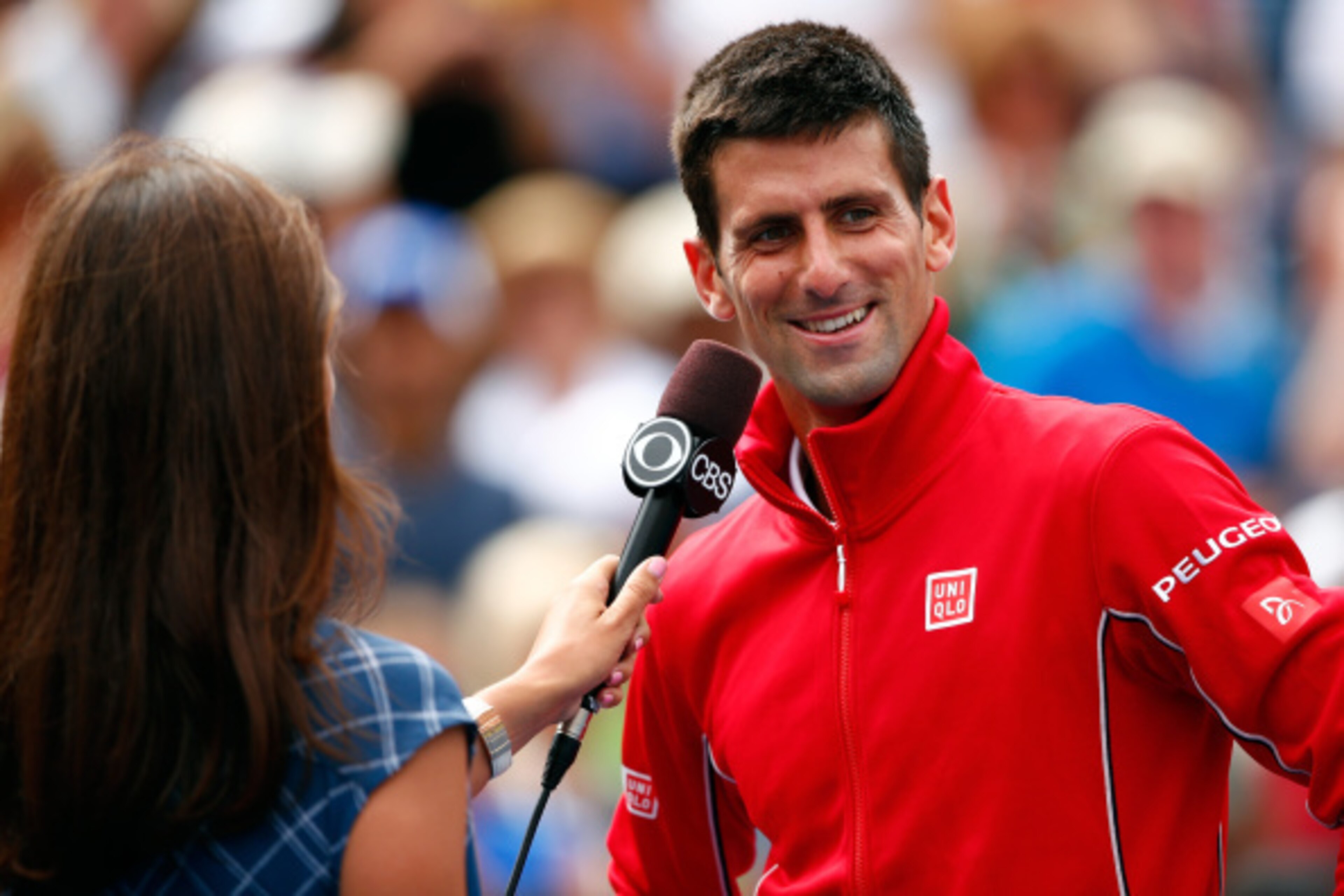 NEW YORK, NY - AUGUST 30:  Novak Djokovic of Serbia is interviewed after defeating Sam Querrey of the United States in their men's singles third round match on Day Six of the 2014 US Open at the USTA Billie Jean King National Tennis Center on August 30, 2