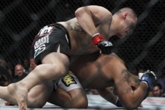 May 25, 2013; Las Vegas, NV, USA; Cain Velasquez applies a hold against Antonio Silva during UFC 160 at the MGM Grand Garden Arena. Mandatory Credit: Gary A. Vasquez-USA TODAY Sports