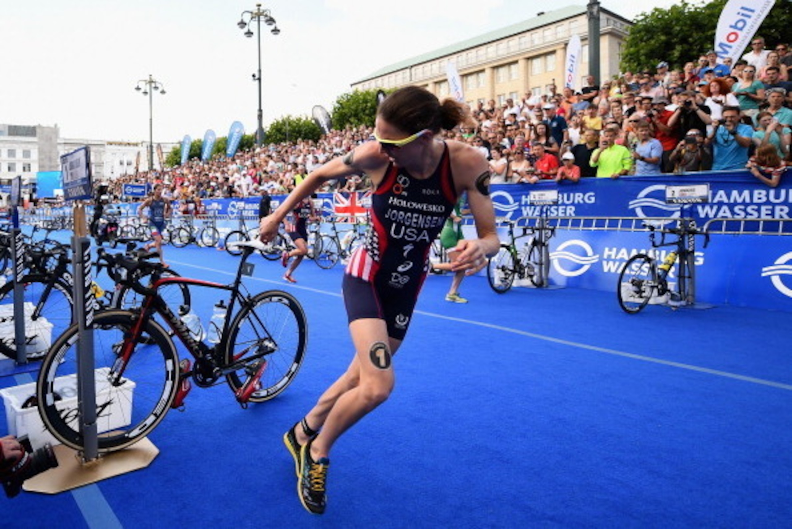 HAMBURG, GERMANY - JULY 12:  Gwen Jorgensen of the United States competes in the Women's ITU World Triathlon sprint event on July 12, 2014 in Hamburg, Germany.  (Photo by Dennis Grombkowski/Getty Images)