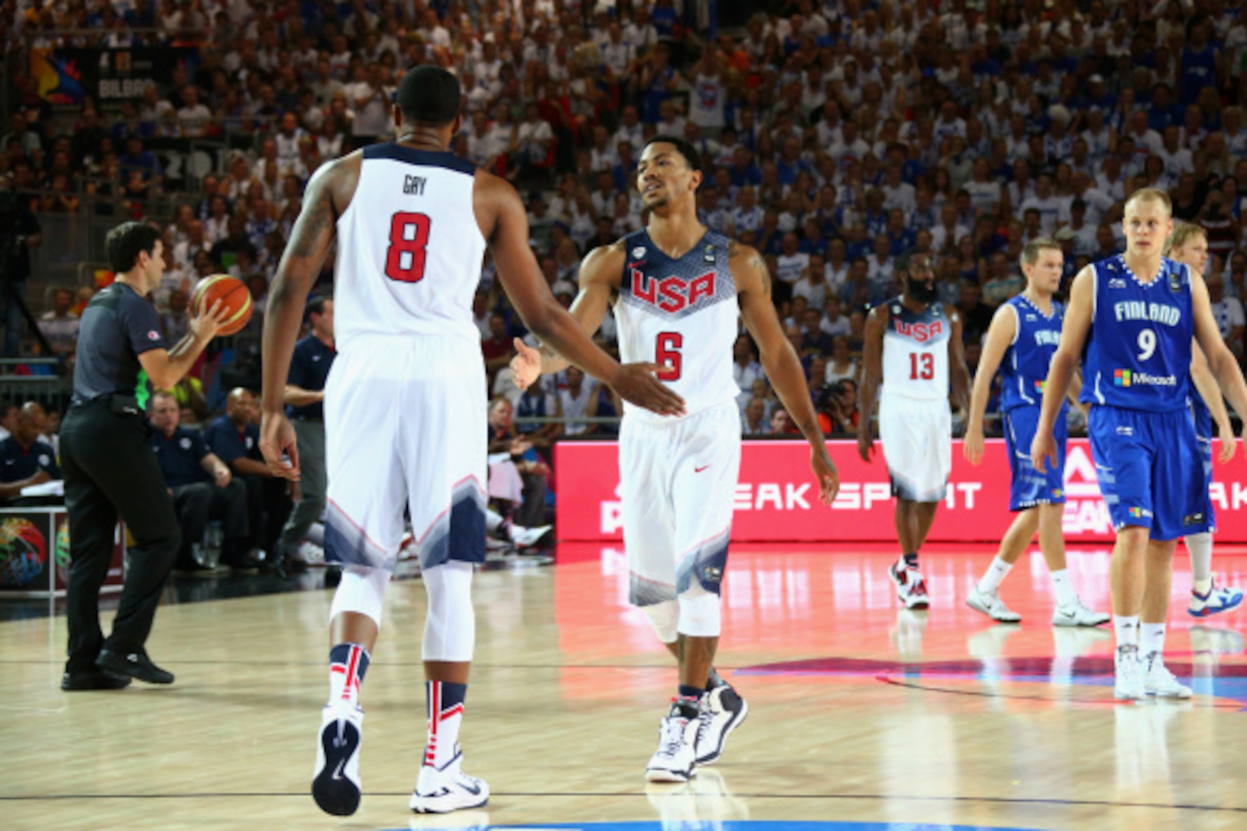 BILBAO, SPAIN - AUGUST 30:  Teammates Rudy Gay #8 and Derrick Rose #6 of the USA Basketball Men's National Team high-five during a game against the Finland Basketball Men's National Team during the 2014 FIBA World Cup at Bizkaia Arena in Bilbao Exhibition