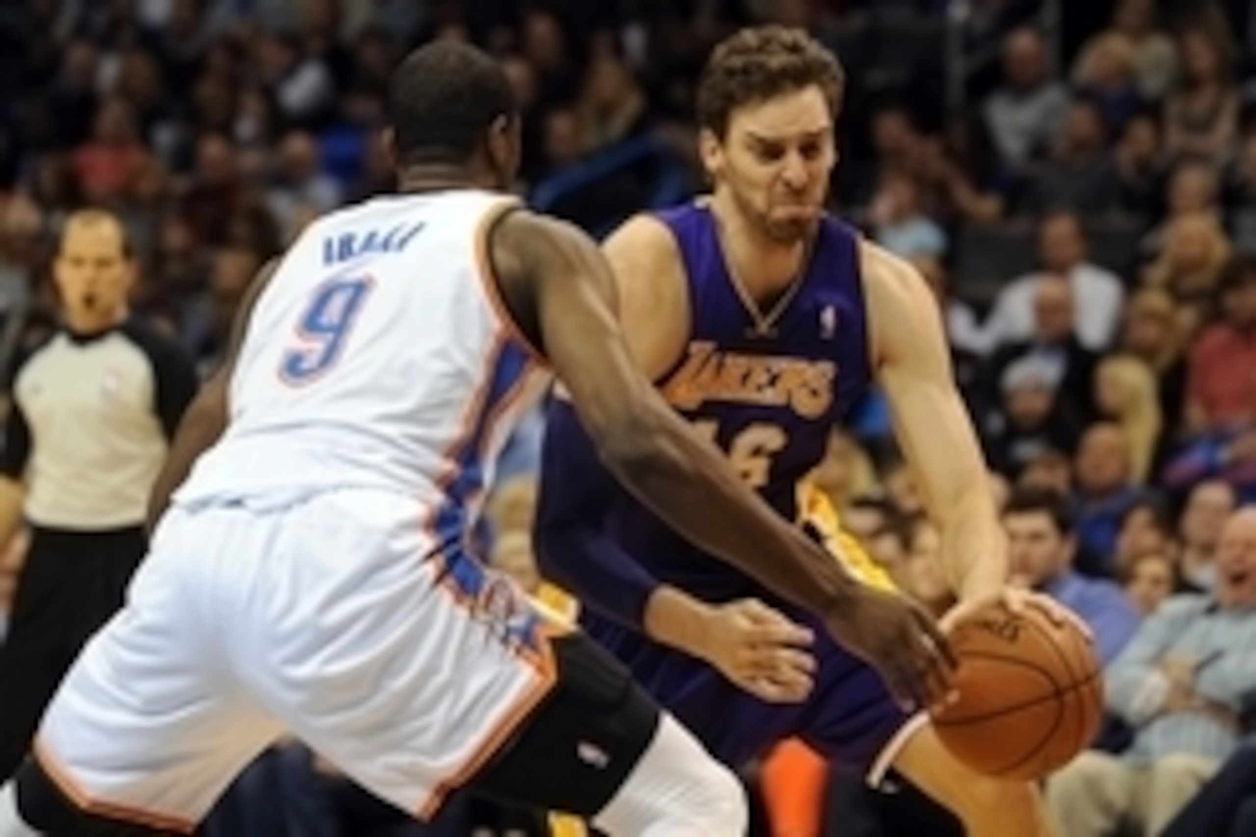 Mar 13, 2014; Oklahoma City, OK, USA;  Los Angeles Lakers center Pau Gasol (16) drives to the basket against Oklahoma City Thunder forward Serge Ibaka (9) during the second quarter at Chesapeake Energy Arena. Mandatory Credit: Mark D. Smith-USA TODAY Spor