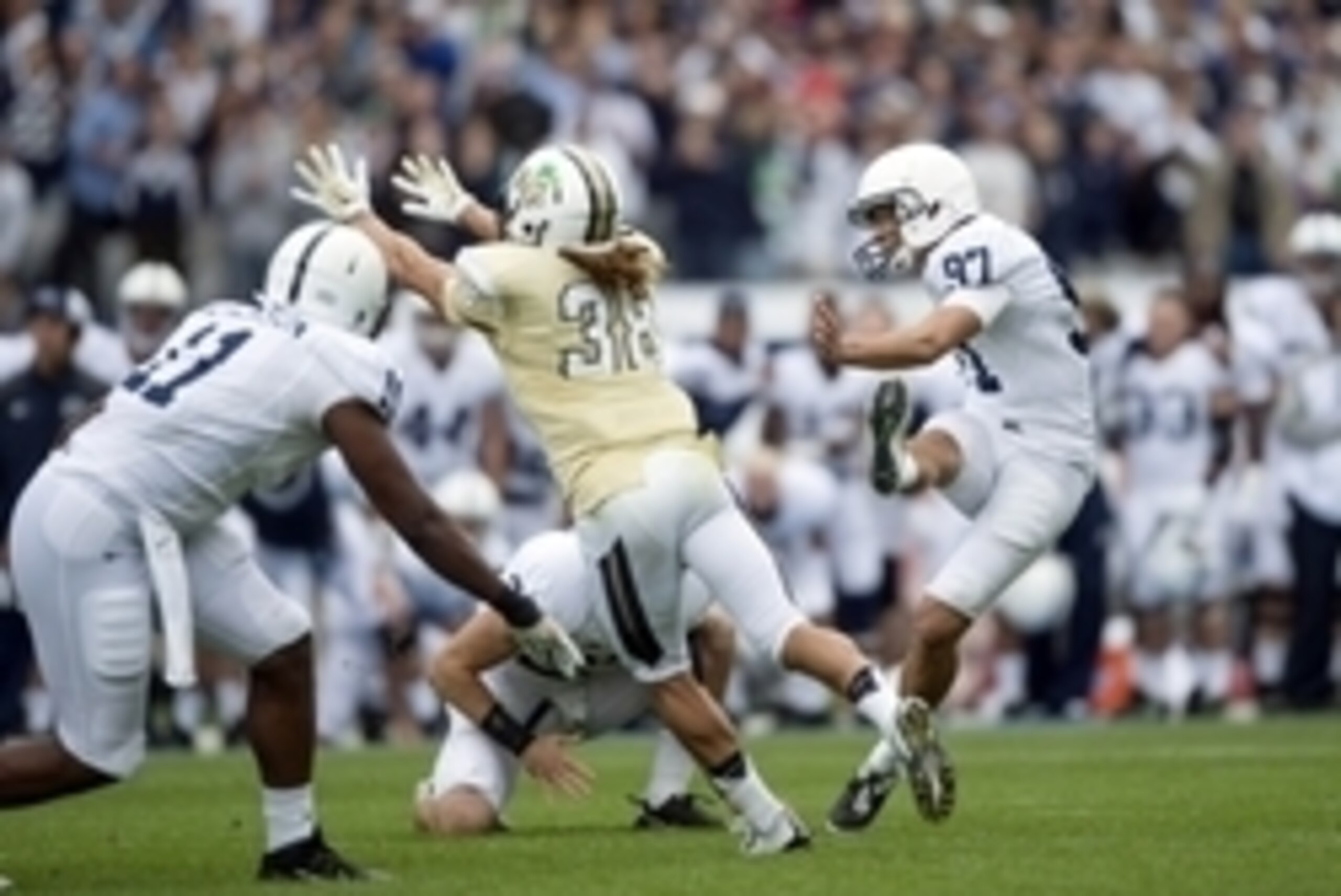 Aug 30, 2014; Dublin, IRL;  Penn State Nittany Lions place kicker Sam Ficken (97) kicks a 37 yard field goal to defeat the Central Florida Knights at Croke Park. Mandatory Credit: Steve Flynn-USA TODAY Sports