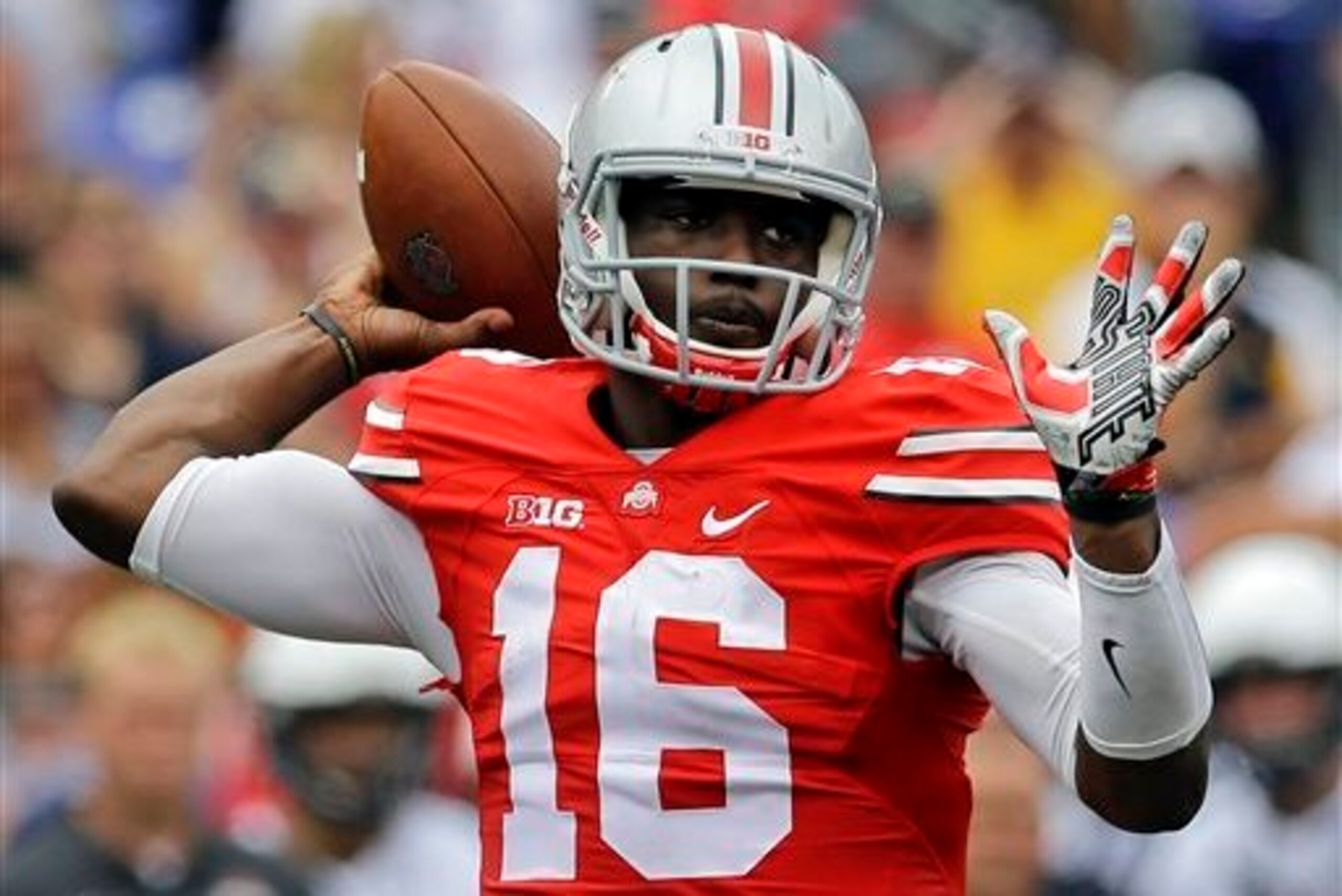 J.T. Barrett threw for 226 yards and two touchdowns in his college debut.
