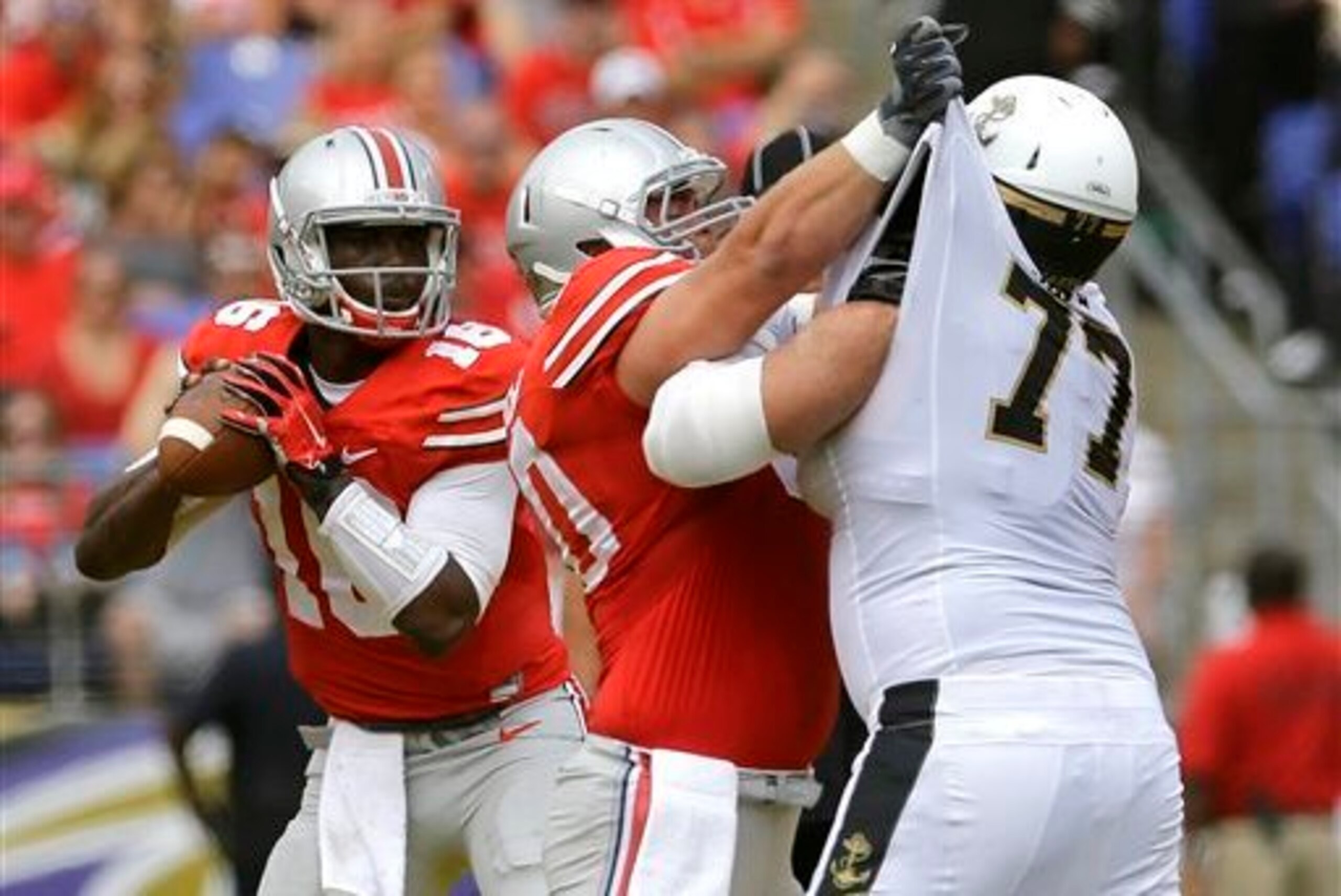 Jacoby Boren blocks for J.T. Barrett.