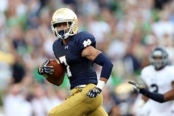 Aug 30, 2014; South Bend, IN, USA; Notre Dame Fighting Irish wide receiver Will Fuller (7) catches a pass for a 75 yard touchdown against the Rice Owls at Notre Dame Stadium. Mandatory Credit: Brian Spurlock-USA TODAY Sports