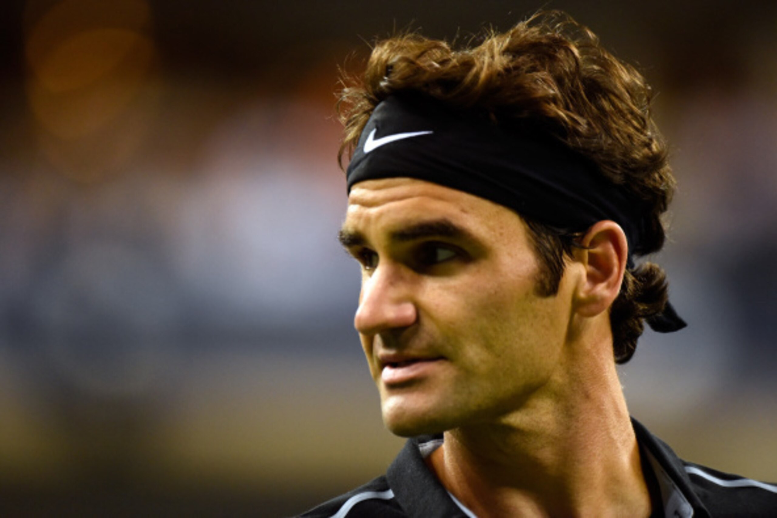 NEW YORK, NY - AUGUST 29:  Roger Federer of Switzerland looks on against Sam Groth of Australia during their men's singles second round match on Day Five of the 2014 US Open at the USTA Billie Jean King National Tennis Center on August 29, 2014 in the Flu