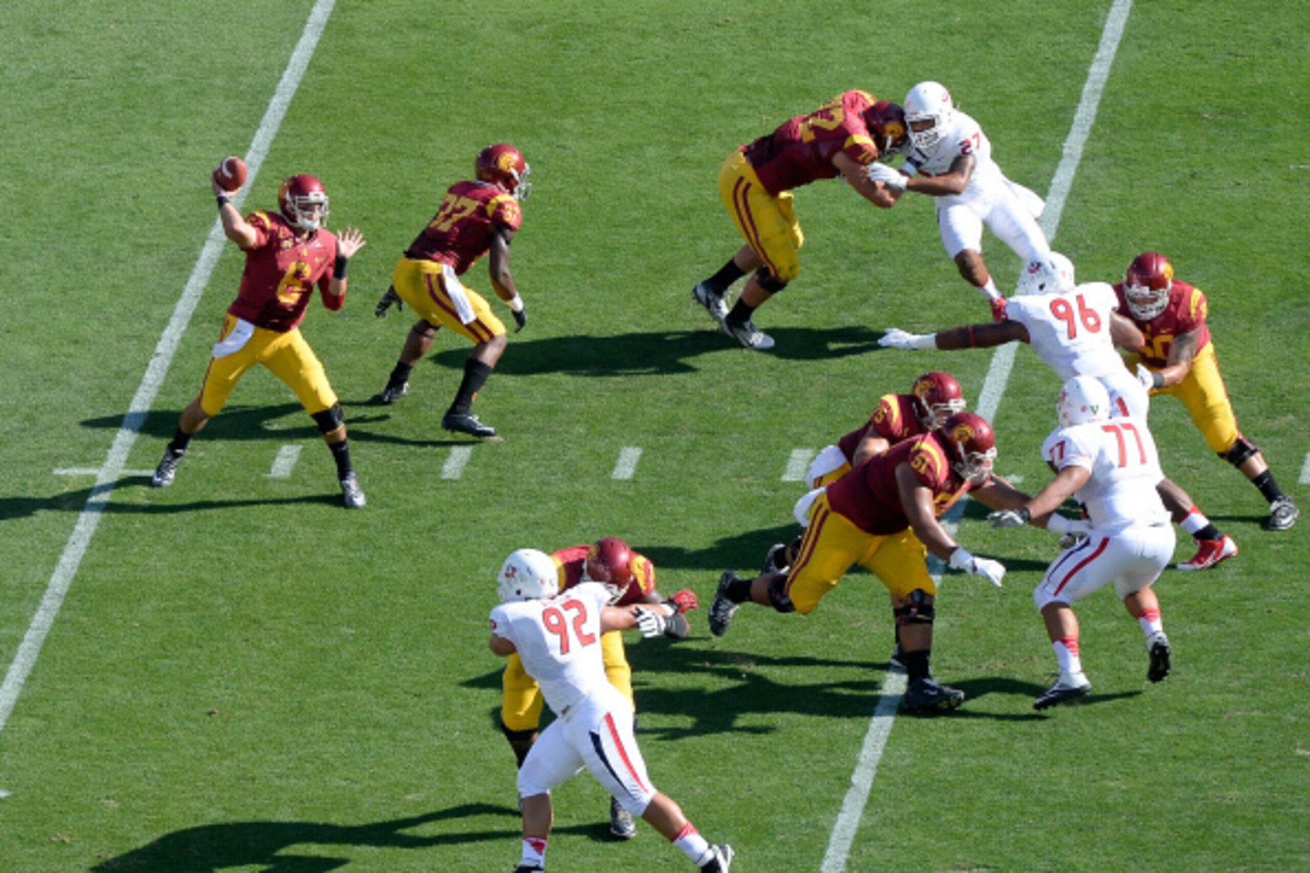 LOS ANGELES, CA - AUGUST 30:  Quarterback Cody Kessler #6 of the USC Trojans passes in the pocket during the first quarter against the Fresno State Bulldogs at Los Angeles Memorial Coliseum on August 30, 2014 in Los Angeles, California.  (Photo by Harry H