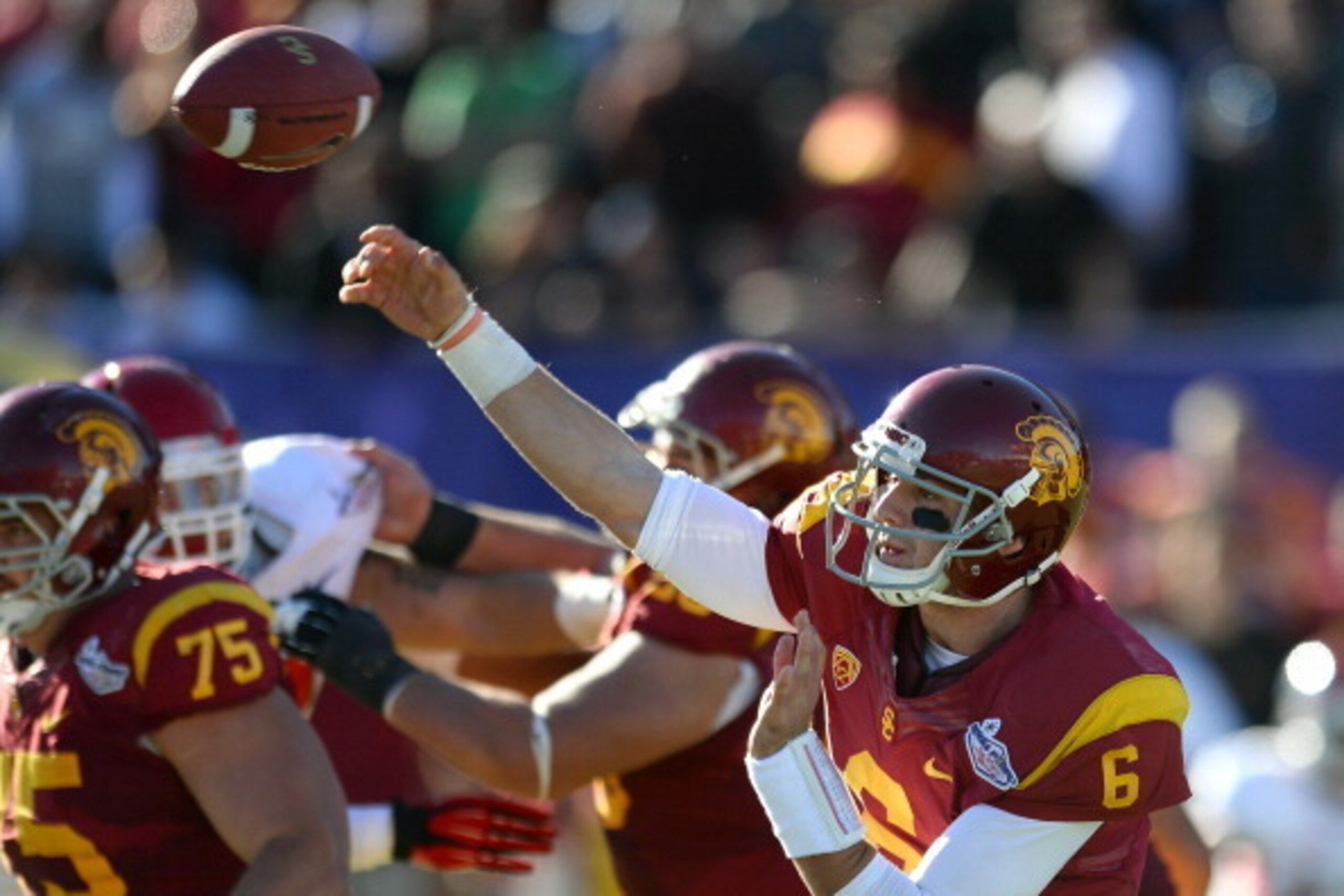 LAS VEGAS, NV - DECEMBER 21:  Quarterback Cody Kessler #6 of the USC Trojans throws against the Fresno State Bulldogs during the Royal Purple Las Vegas Bowl at Sam Boyd Stadium on December 21, 2013 in Las Vegas, Nevada. USC won 45-20.  (Photo by Ethan Mil