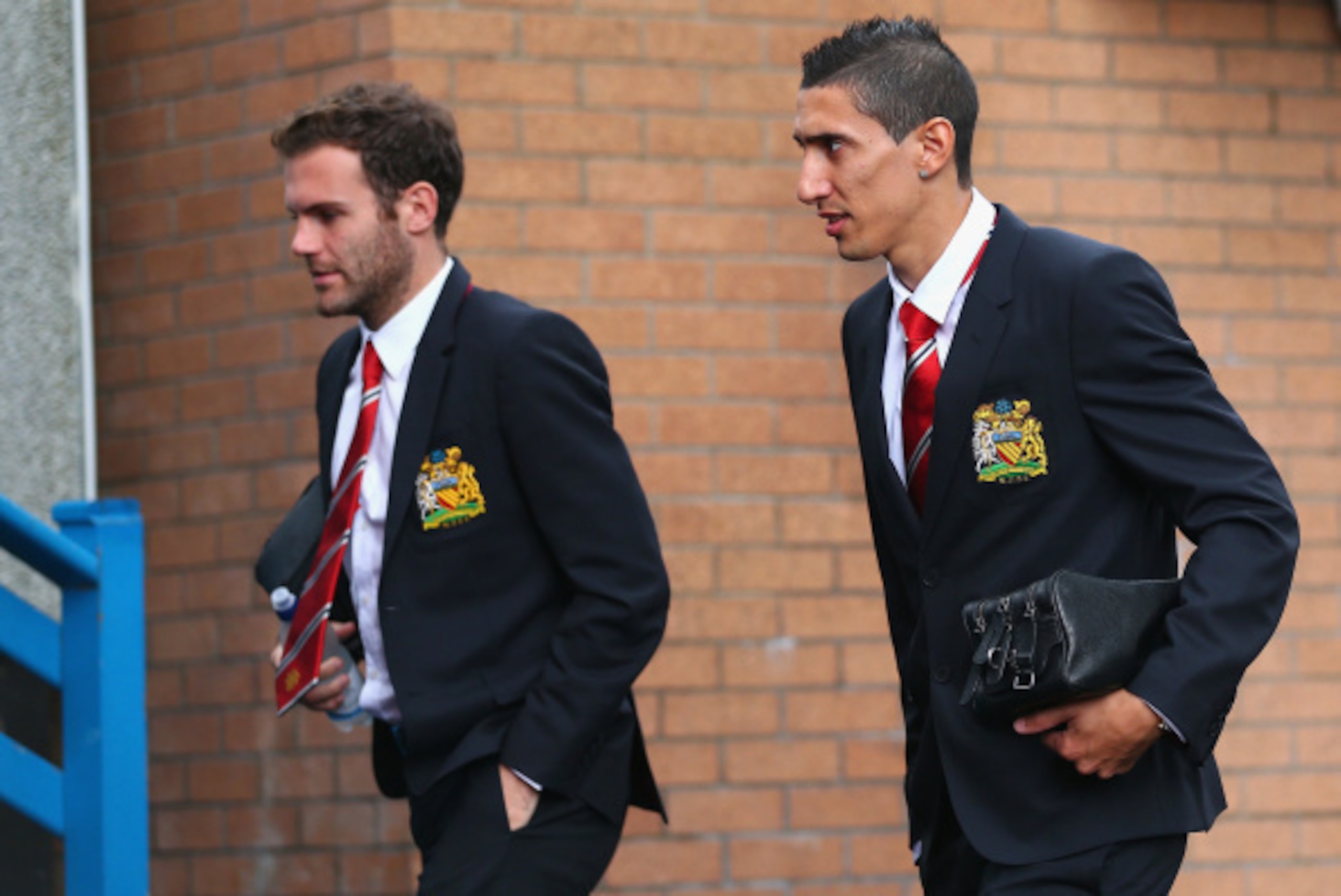 BURNLEY, ENGLAND - AUGUST 30:  Juan Mata and Angel di Maria of Manchester United arrive ahead of the Barclays Premier League match between Burnley and Manchester United at Turf Moor on August 30, 2014 in Burnley, England.  (Photo by Clive Brunskill/Getty 