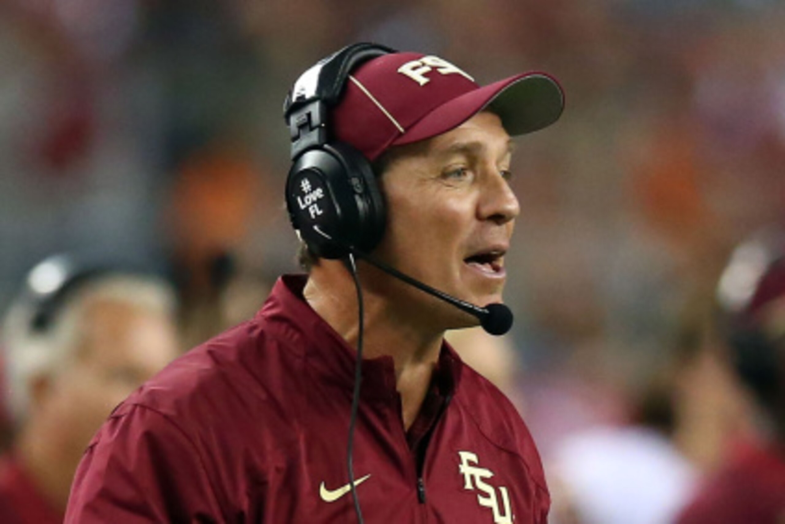 ARLINGTON, TX - AUGUST 30:  (EDITORS NOTE: ALTERNATE CROP) Florida State Seminoles head coach Jimbo Fisher looks on against the Oklahoma State Cowboys in the first half of the Advocare Cowboys Classic at AT&T Stadium on August 30, 2014 in Arlington, Texas