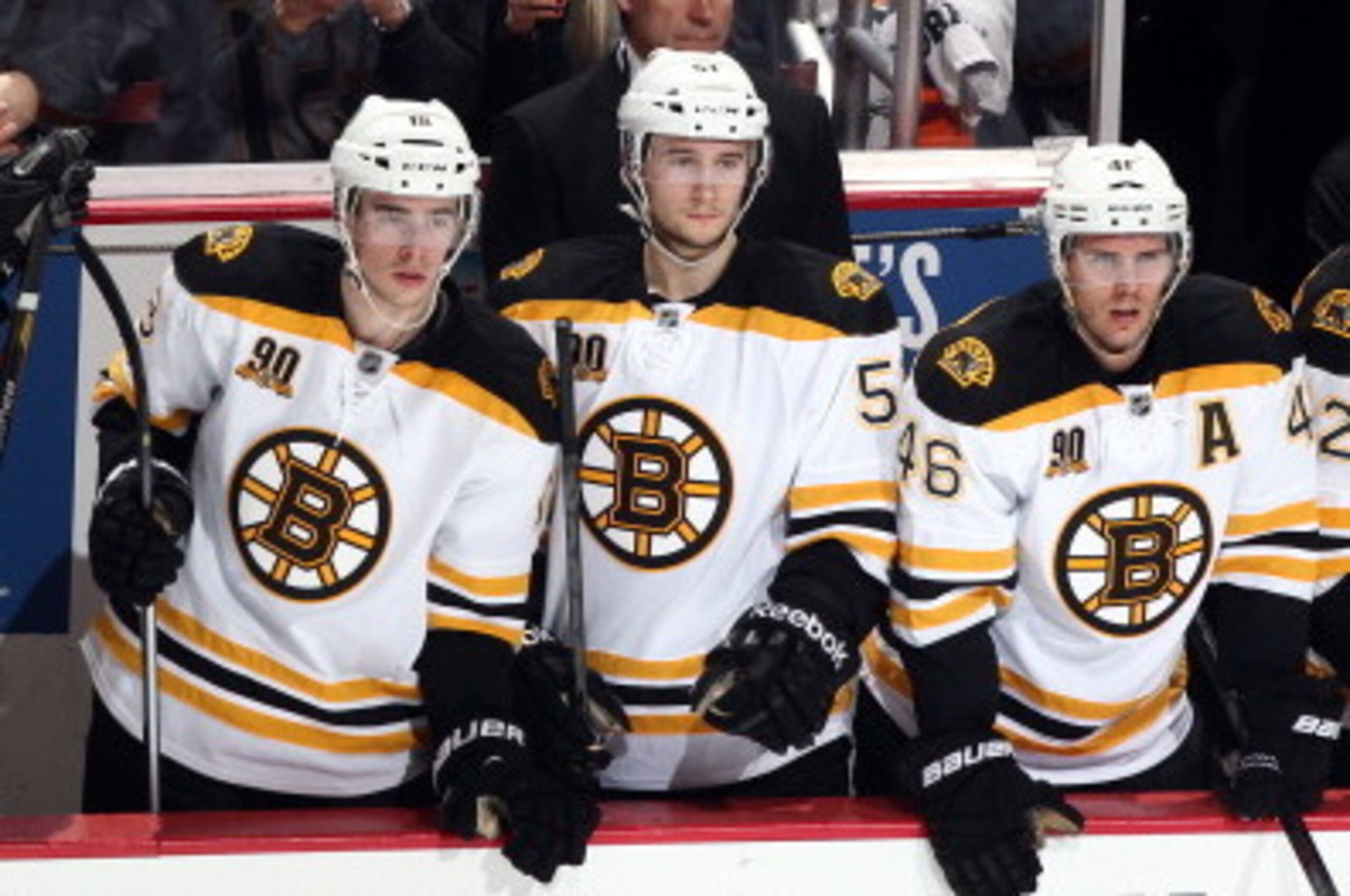 ANAHEIM, CA - JANUARY 7:  Patrice Bergeron #37, Carl Soderberg #34, Reilly Smith #18, Ryan Spooner #51 and David Krejci #46 of the Boston Bruins look on from the bench during the game against the Anaheim Ducks on January 7, 2014 at Honda Center in Anaheim