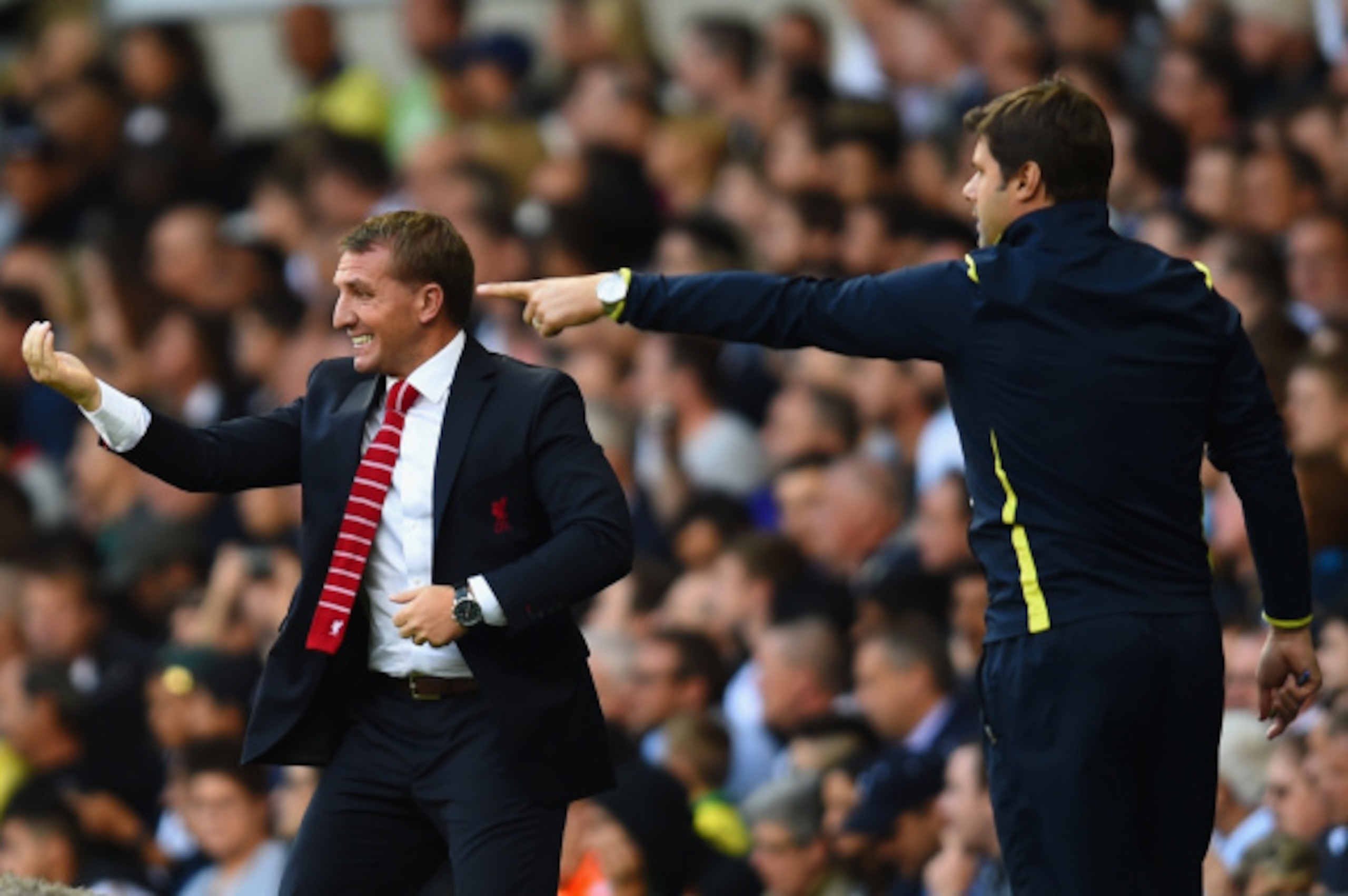 LONDON, ENGLAND - AUGUST 31:  Brendan Rodgers, manager of Liverpool and Mauricio Pochettino the Spurs manager on the touchline during the Barclays Premier League match between Tottenham Hotspur and Liverpool at White Hart Lane on August 31, 2014 in London