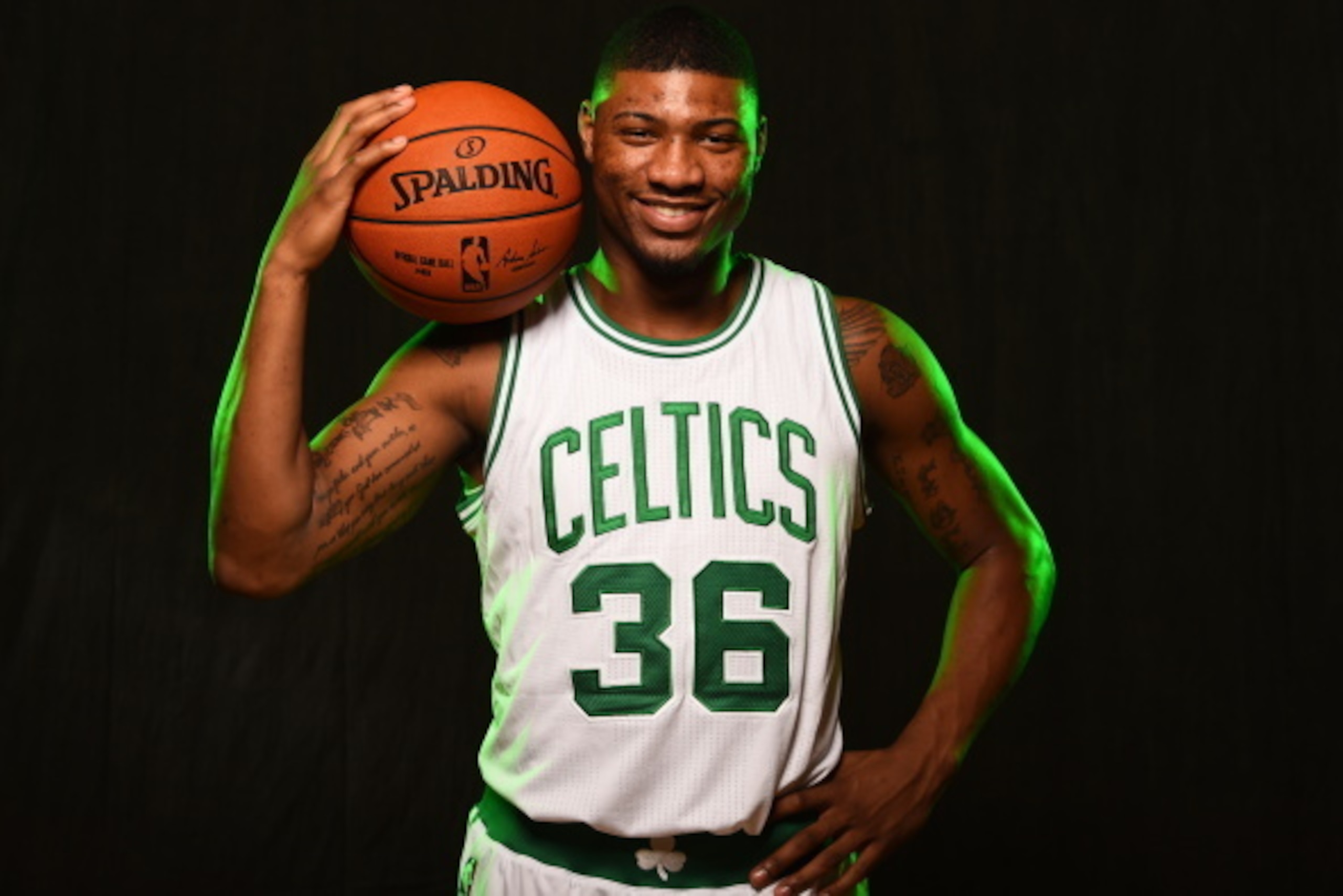 TARRYTOWN, NY - AUGUST 3:  Marcus Smart #36 of the Boston Celtics poses for a portrait during the 2014 NBA rookie photo shoot on August 3, 2014 at the Madison Square Garden Training Facility in Tarrytown, New York. NOTE TO USER: User expressly acknowledge