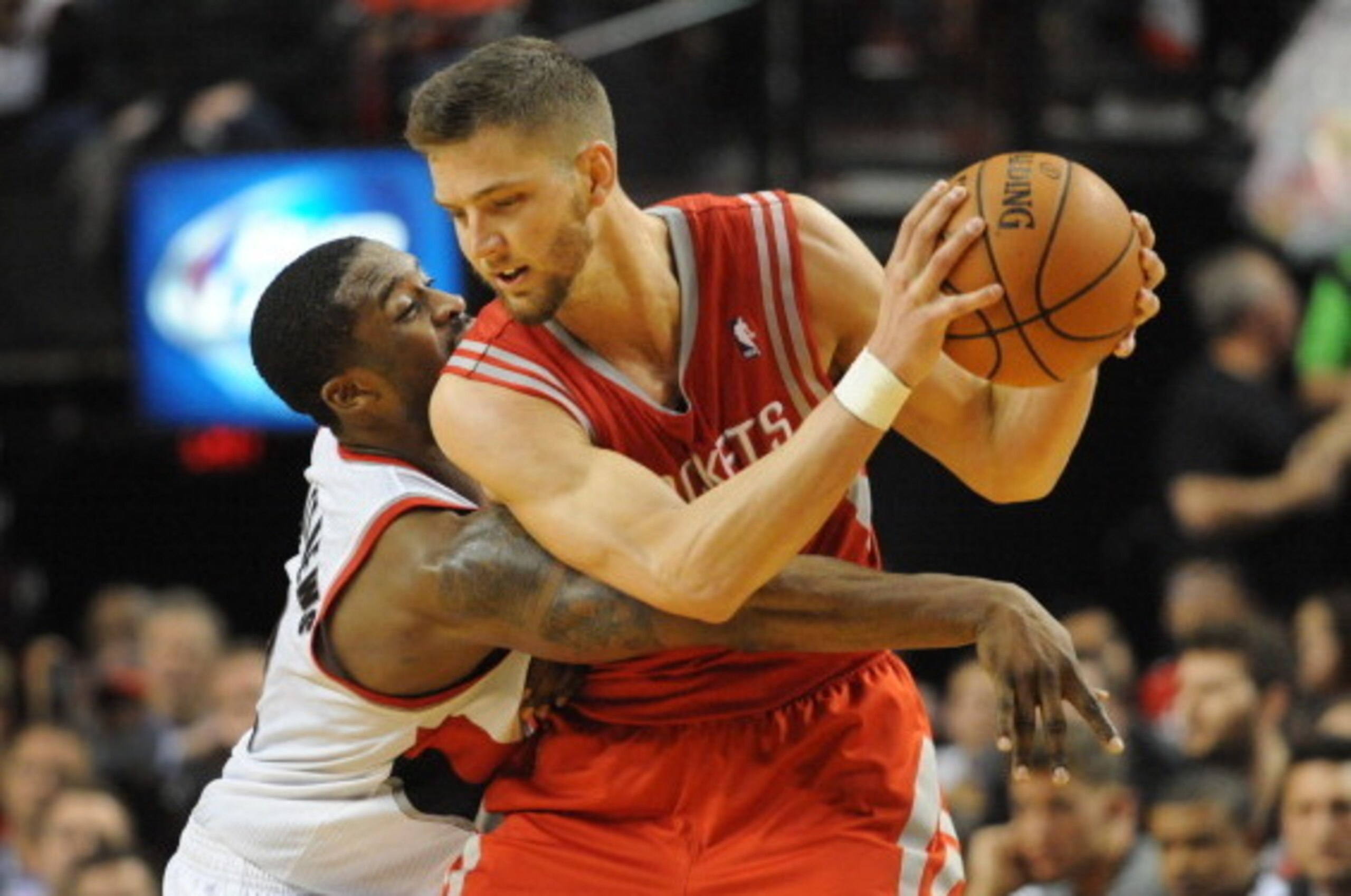 PORTLAND, OR - APRIL  27: Wesley Matthews #2 of the Portland Trail Blazers reaches in on Chandler Parsons #25 of the Houston Rockets in the fourth quarter of Game Four of the Western Conference Quarterfinals during the 2014 NBA Playoffs at the Moda Center