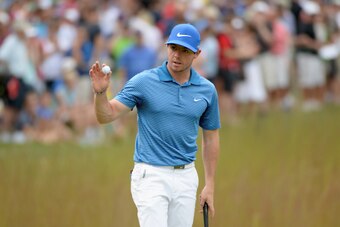 NORTON, MA - AUGUST 31:  Rory McIlroy of Northern Ireland makes birdie on the 16th hole during the third round of the Deutsche Bank Championship at the TPC Boston on August 31, 2014 in Norton, Massachusetts.  (Photo by Ross Kinnaird/Getty Images)