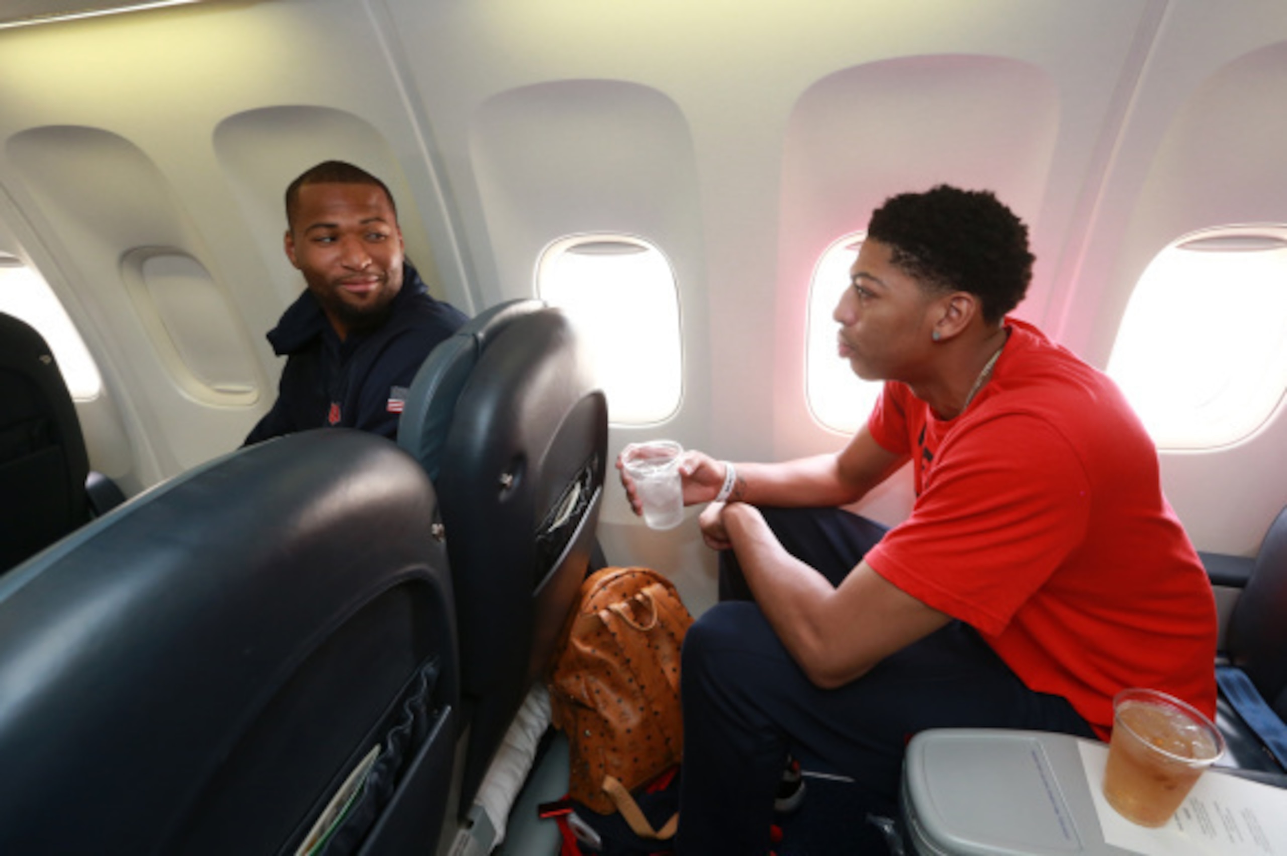 LAS PALMAS, GRAN CANARIA, SPAIN - AUGUST 27: DeMarcus Cousins and Anthony Davis of the USA Basketball Men's National Team boards the airplane on August 27, 2014 at Gran Canaria Airport in Las Palmas, Gran Canaria, Spain. NOTE TO USER: User expressly ackn LAS PALMAS, GRAN CANARIA, SPAIN - AUGUST 27: DeMarcus Cousins and Anthony Davis of the USA Basketball Men's National Team boards the airplane on August 27, 2014 at Gran Canaria Airport in Las Palmas, Gran Canaria, Spain. NOTE TO USER: User expressly ackn