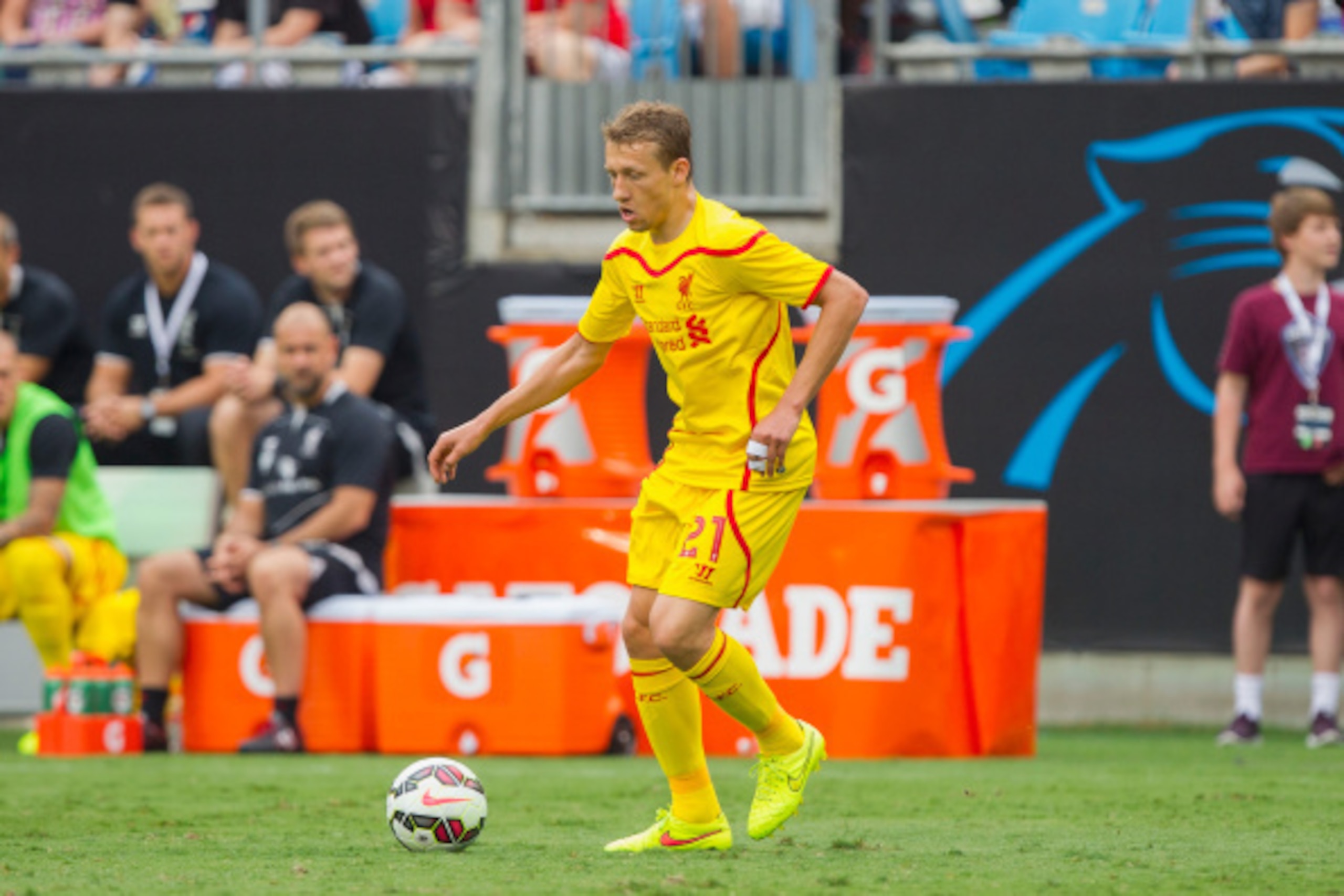 CHARLOTTE, NC - AUGUST 02: Lucas Leiva #21 of Liverpool controls the ball during first half action against A.C. Milan in the Guinness International Champions Cup at Bank of America Stadium on August 2, 2014 in Charlotte, North Carolina. Liverpool defeated CHARLOTTE, NC - AUGUST 02: Lucas Leiva #21 of Liverpool controls the ball during first half action against A.C. Milan in the Guinness International Champions Cup at Bank of America Stadium on August 2, 2014 in Charlotte, North Carolina. Liverpool defeated