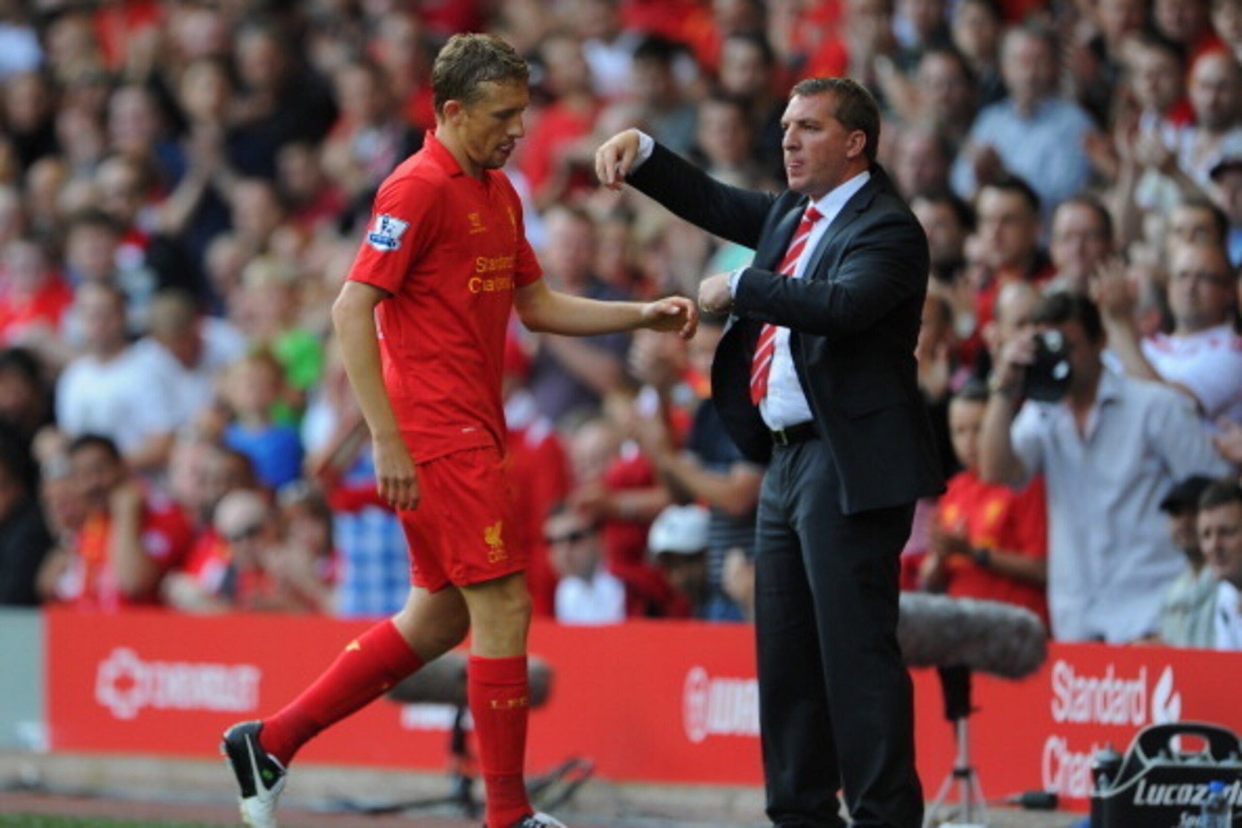 LIVERPOOL, ENGLAND - AUGUST 26: Lucas of Liverpool walks off after sustaining an injury and being substituted during the Barclays Premier League match between Liverpool and Manchester City at Anfield on August 26, 2012 in Liverpool, England. (Photo by M LIVERPOOL, ENGLAND - AUGUST 26: Lucas of Liverpool walks off after sustaining an injury and being substituted during the Barclays Premier League match between Liverpool and Manchester City at Anfield on August 26, 2012 in Liverpool, England. (Photo by M