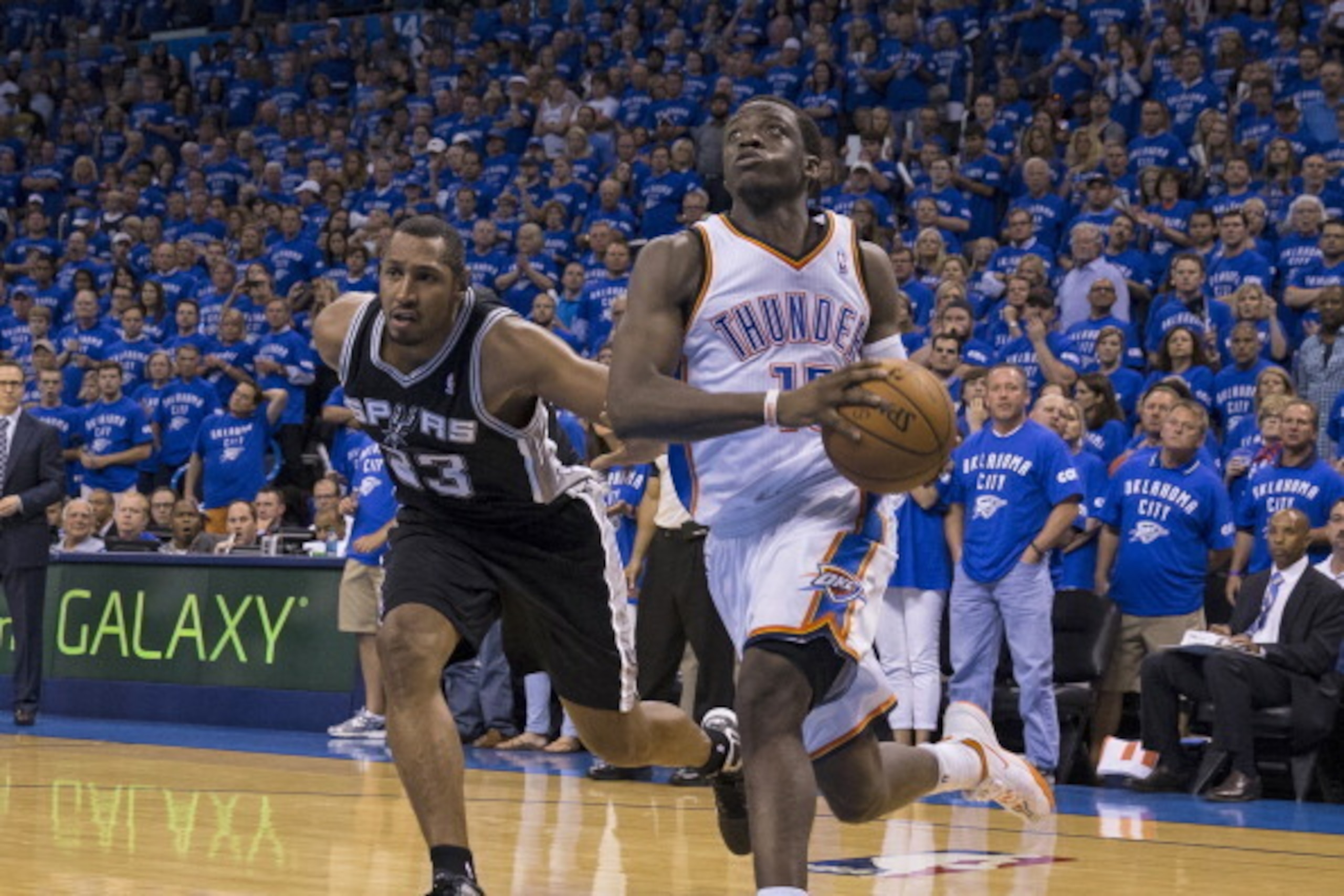 OKLAHOMA CITY, OK - MAY 25:  Reggie Jackson #15 of the Oklahoma City Thunder drives to the basket against the San Antonio Spurs in Game 3 of the Western Conference Finals during the 2014 NBA Playoffs at the Chesapeake Arena on May 25, 2014 in Oklahoma Cit