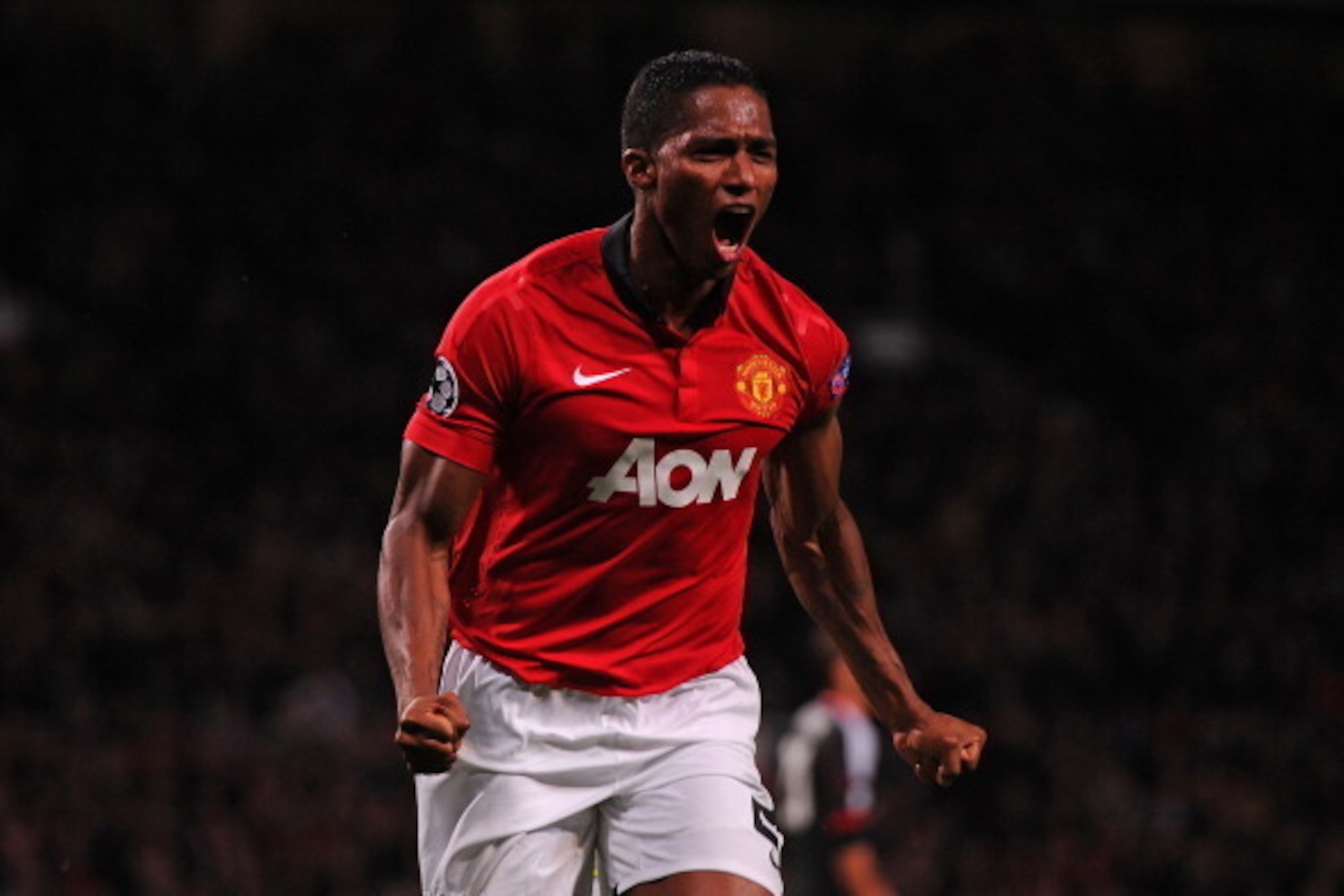 MANCHESTER, ENGLAND - SEPTEMBER 17:  Antonio Valencia of Manchester United celebrates scoring his team's fourth goal during the UEFA Champions League Group A match between Manchester United and Bayer Leverkusen at Old Trafford on September 17, 2013 in Man