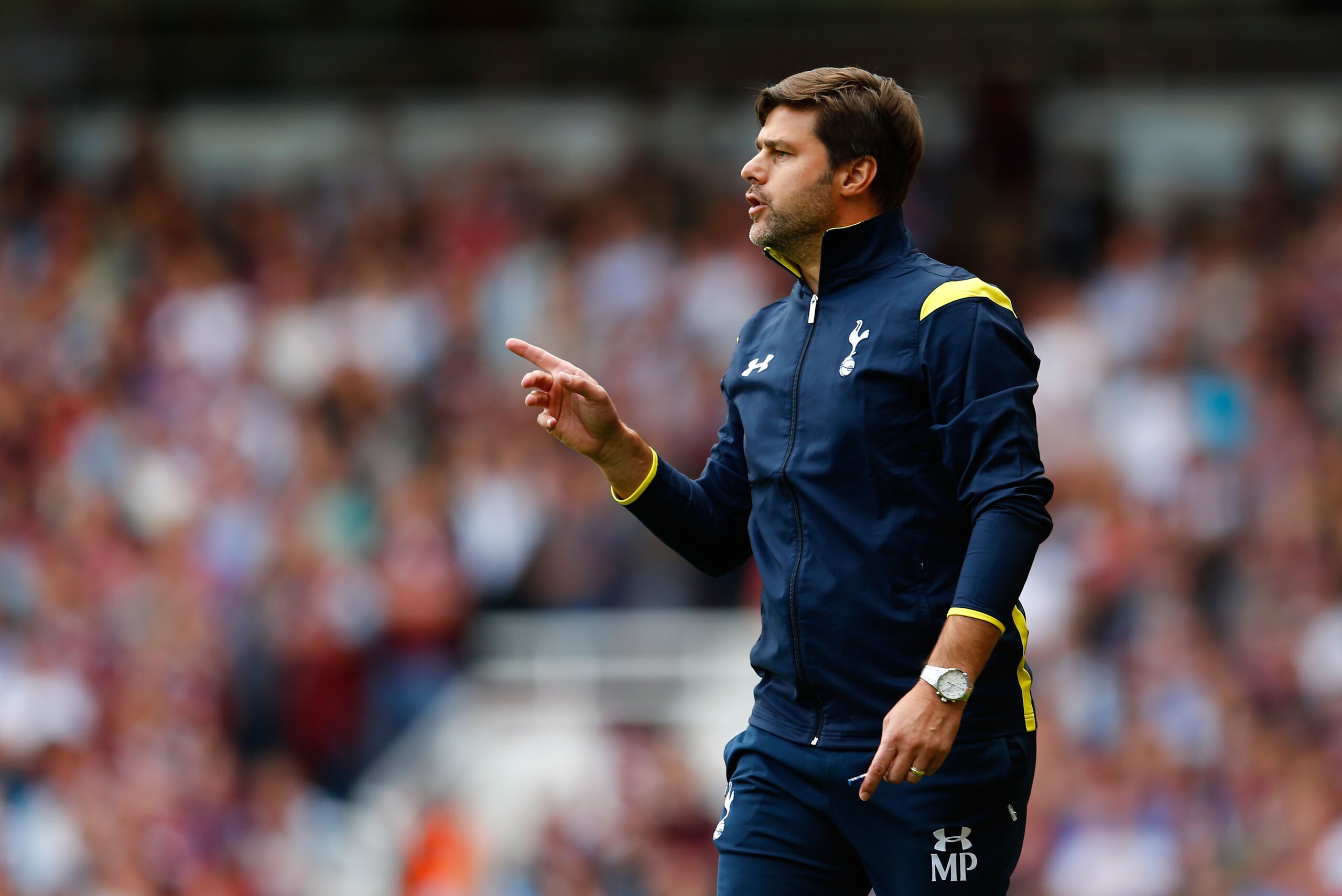LONDON, ENGLAND - AUGUST 16:  Mauricio Pochettino the Spurs manager looks on during the Barclays Premier League match between West Ham United and Tottenham Hotspur at Boleyn Ground on August 16, 2014 in London, England.  (Photo by Julian Finney/Getty Imag