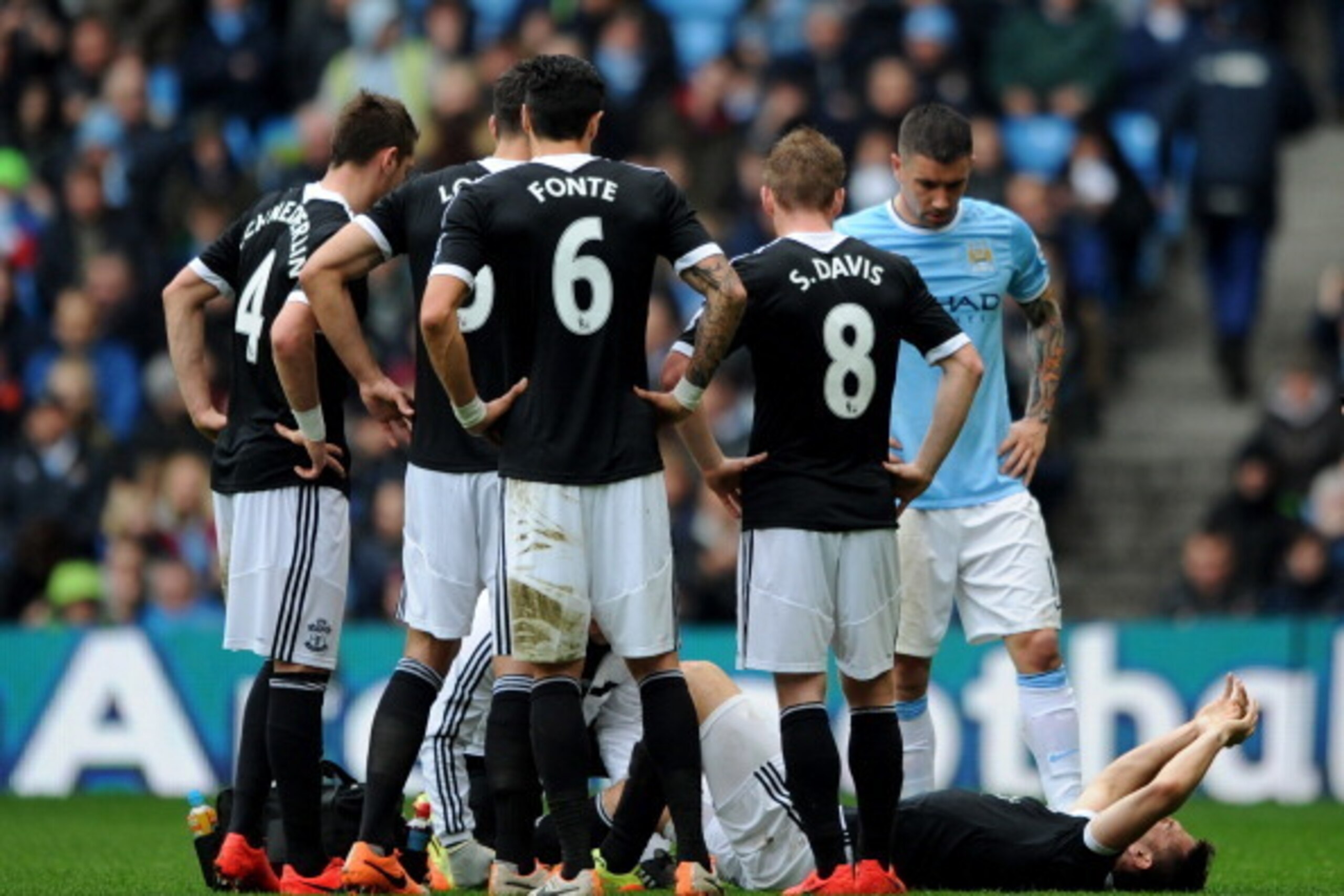 MANCHESTER, ENGLAND - APRIL 05:  Jay Rodriguez of Southampton goes down injured after landing awkwardly during the Barclays Premier League match between Manchester City and Southampton at Etihad Stadium on April 5, 2014 in Manchester, England.  (Photo by 