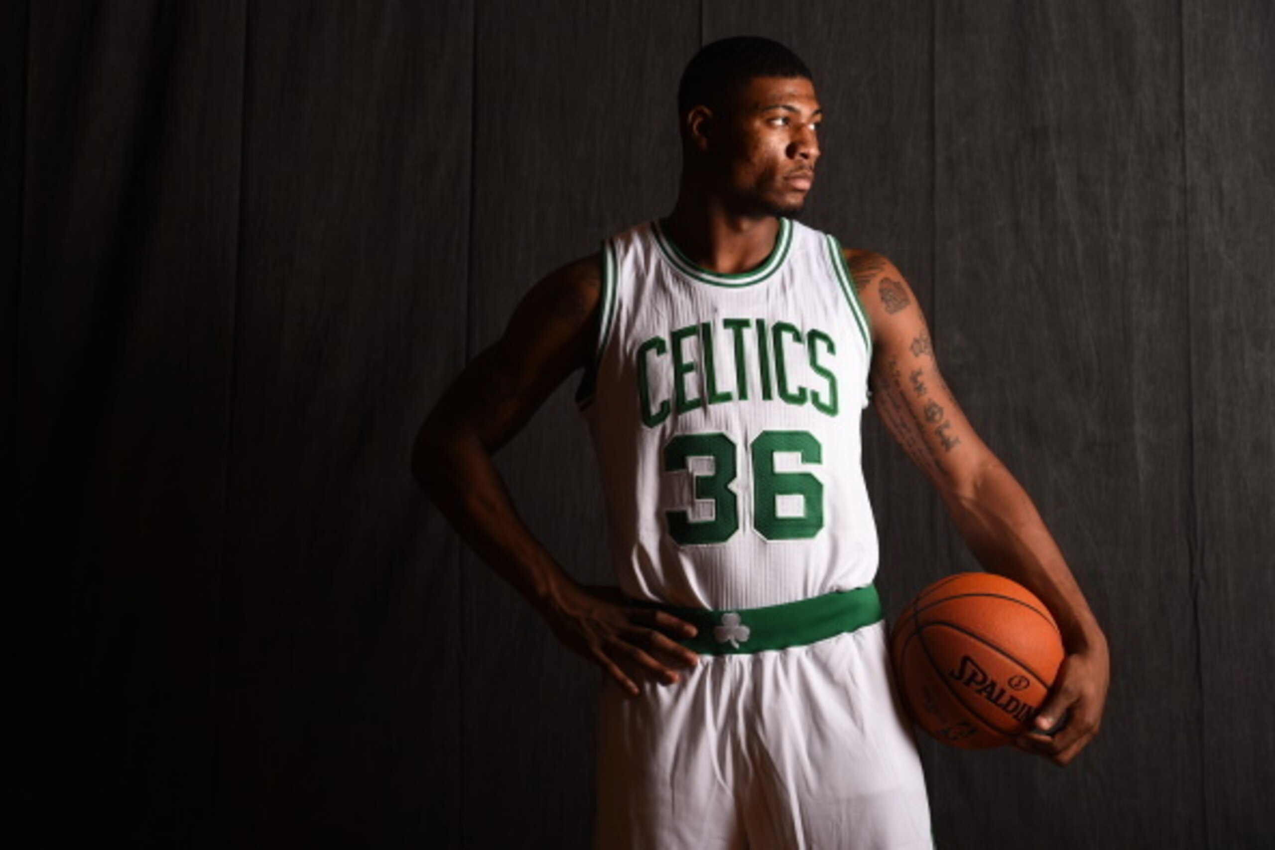 TARRYTOWN, NY - AUGUST 3:  Marcus Smart #36 of the Boston Celtics poses for a portrait during the 2014 NBA rookie photo shoot on August 3, 2014 at the Madison Square Garden Training Facility in Tarrytown, New York. NOTE TO USER: User expressly acknowledge