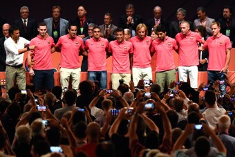 BARCELONA, SPAIN - AUGUST 18:  (L-R) Thomas Vermaelen, Claudio Bravo, Jordi Masip, Rafinha, Head Coach Luis Enrique, President Josep Maria Bartomeu, Ivan Rakitic, Luis Suarez, Jeremy Mathieu and Marc-Andre Ter Stegen of FC Barcelona pose for FC Barcelona 