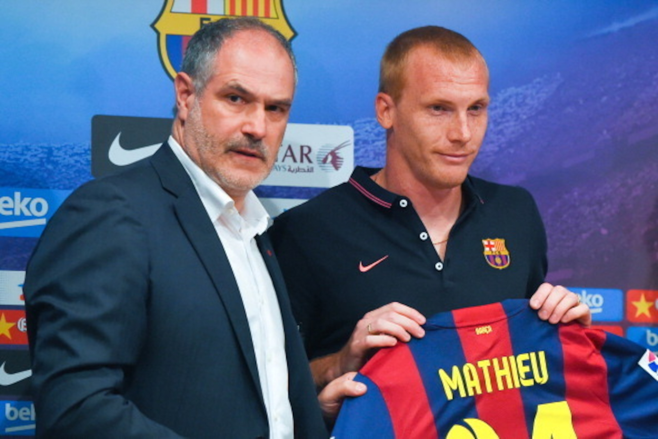 BARCELONA, SPAIN - JULY 24:  Jeremy Mathieu (R) poses with the FC Barcelona sport director Andoni Zubizarreta as a new player of FC Barcelona at the Camp Nou on July 24, 2014 in Barcelona, Spain.  (Photo by David Ramos/Getty Images)