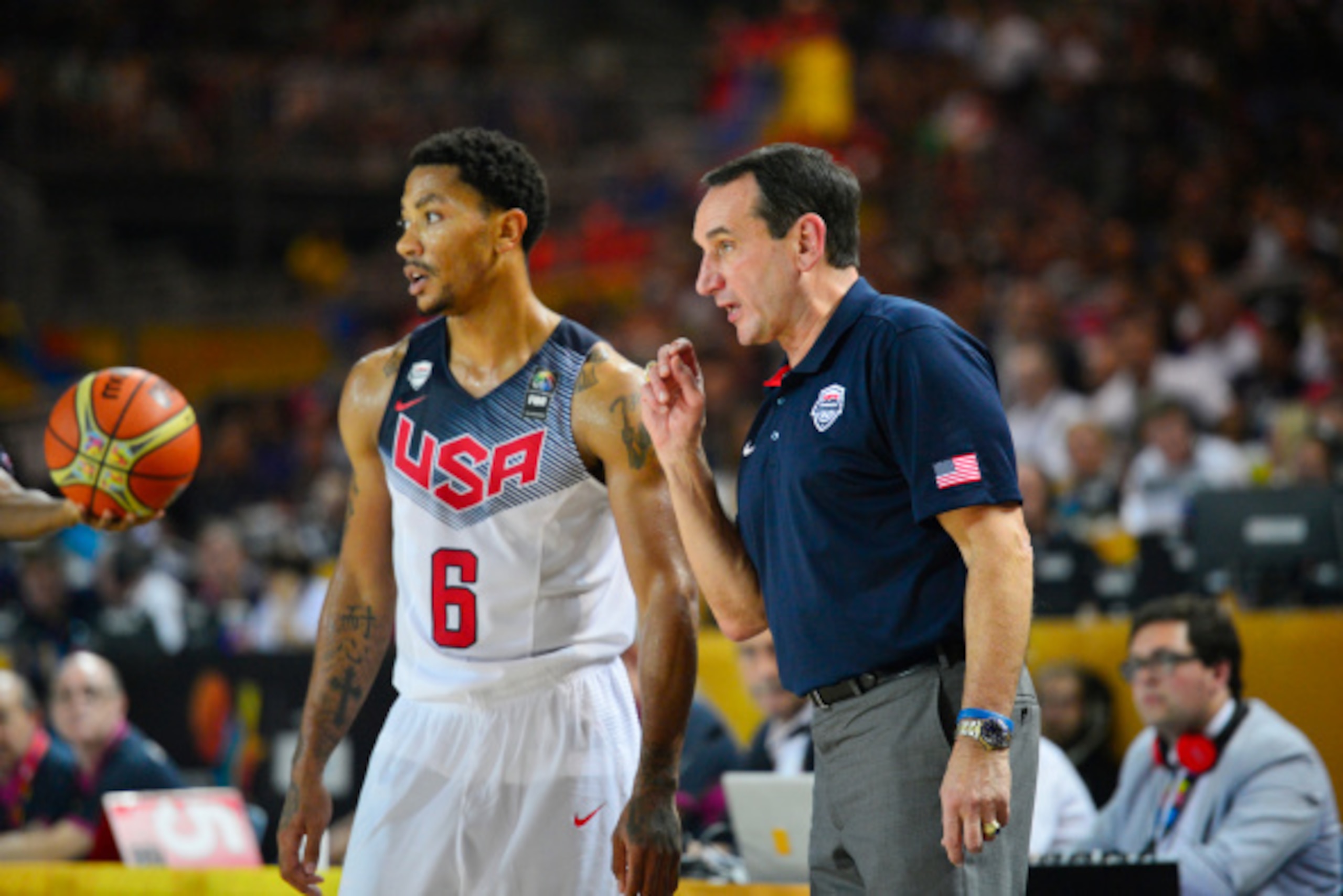 BILBAO, SPAIN - AUGUST 30:  Mike Krzyzewski Head Coach and Derrick Rose # 6 of the USA Basketball Men's National Team converse during a game against the Finland Nation Basketball Team at the FIBA 2014 World Cup Tournament at the Bilbao Exhibition Center o