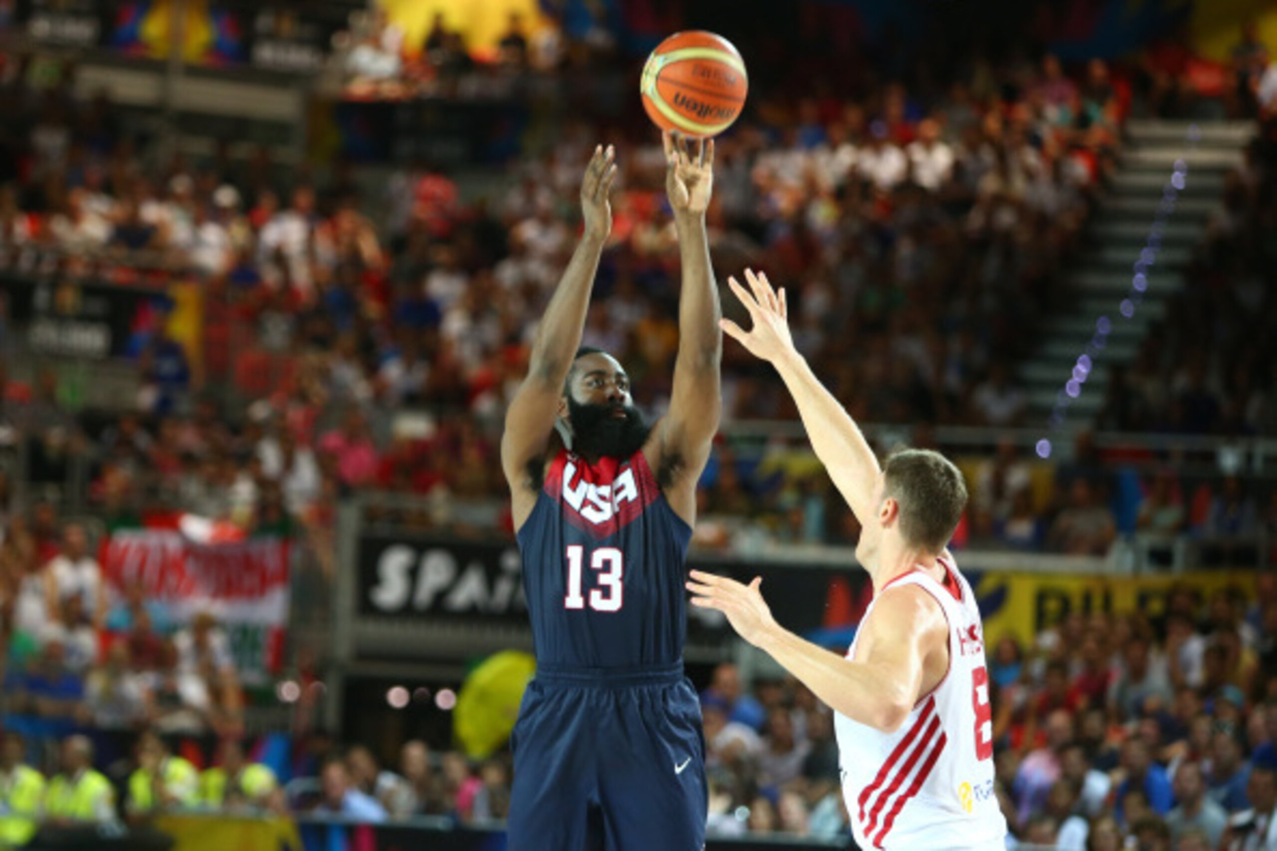 BILBAO, SPAIN - AUGUST 31: James Harden #13 of the USA Basketball Men's National Team shoots against Baris Hersek #8 of the Turkey Basketball Men's National Team during the 2014 FIBA World Cup at Bizkaia Arena in Bilbao Exhibition Centre on August 31, 201