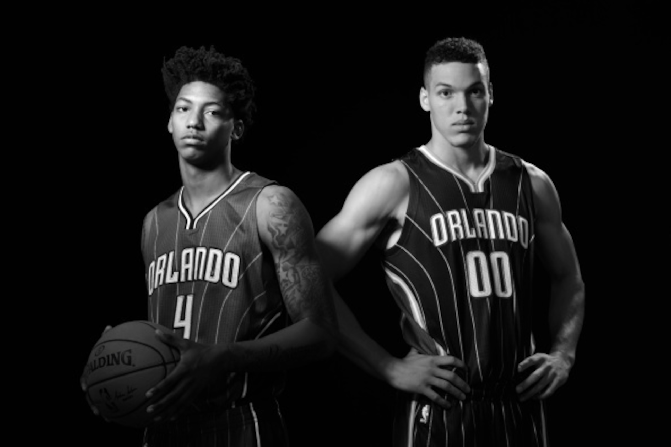 TARRYTOWN, NY - AUGUST 3: Aaron Gordon #00 and Elfrid Payton #4 of the Orlando Magic poses for a portrait during the 2014 NBA rookie photo shoot on August 3, 2014 at the Madison Square Garden Training Facility in Tarrytown, New York. NOTE TO USER: User ex