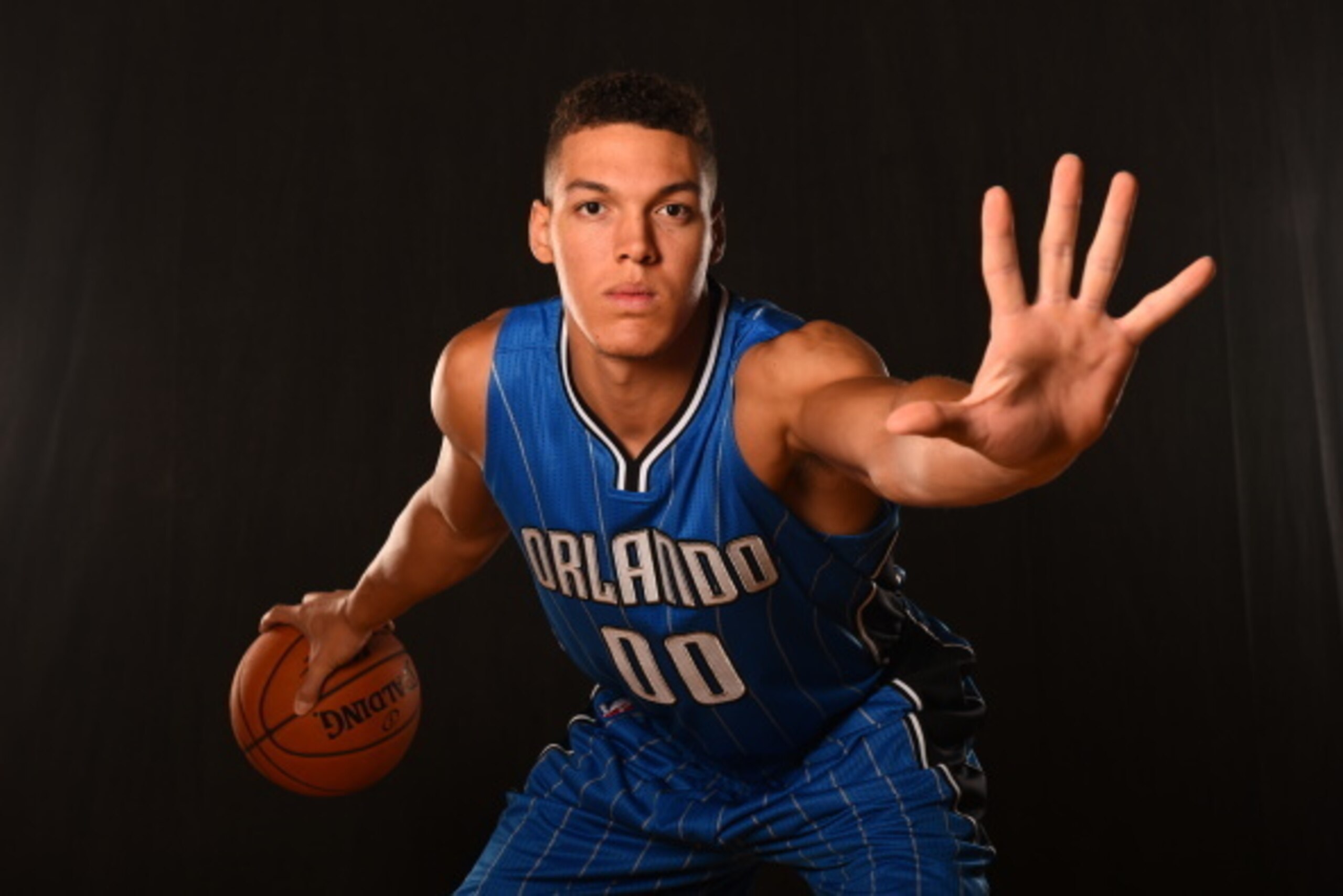 TARRYTOWN, NY - AUGUST 3:  Aaron Gordon #00 of the Orlando Magic poses for a portrait during the 2014 NBA rookie photo shoot on August 3, 2014 at the Madison Square Garden Training Facility in Tarrytown, New York. NOTE TO USER: User expressly acknowledges