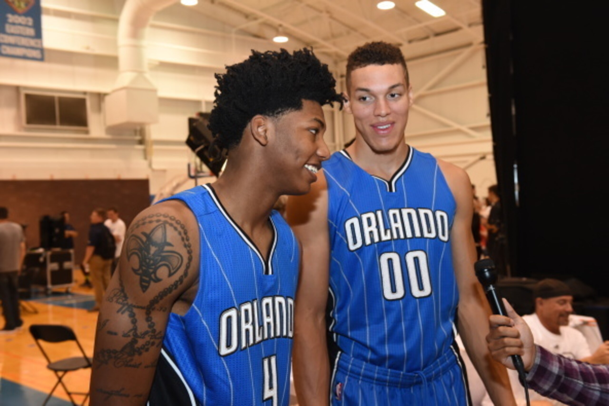 TARRYTOWN, NY - AUGUST 3:  Elfrid Payton #4 and Aaron Gordon #00 of the Orlando Magic behind the scenes during the 2014 NBA rookie photo shoot on August 3, 2014 at the Madison Square Garden Training Facility in Tarrytown, New York. NOTE TO USER: User expr