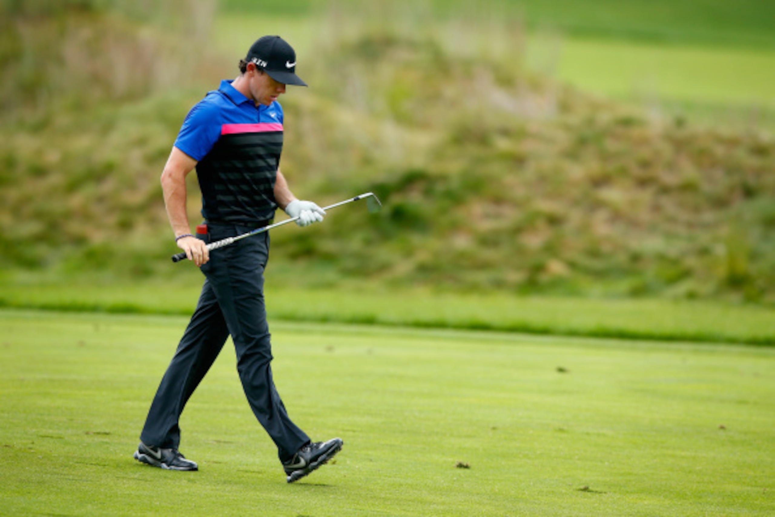 NORTON, MA - SEPTEMBER 01:  Rory McIlroy of Northern Ireland reacts after a missed shot on the sixth hole during the final round of the Deutsche Bank Championship at the TPC Boston on September 1, 2014 in Norton, Massachusetts.  (Photo by Jared Wickerham/