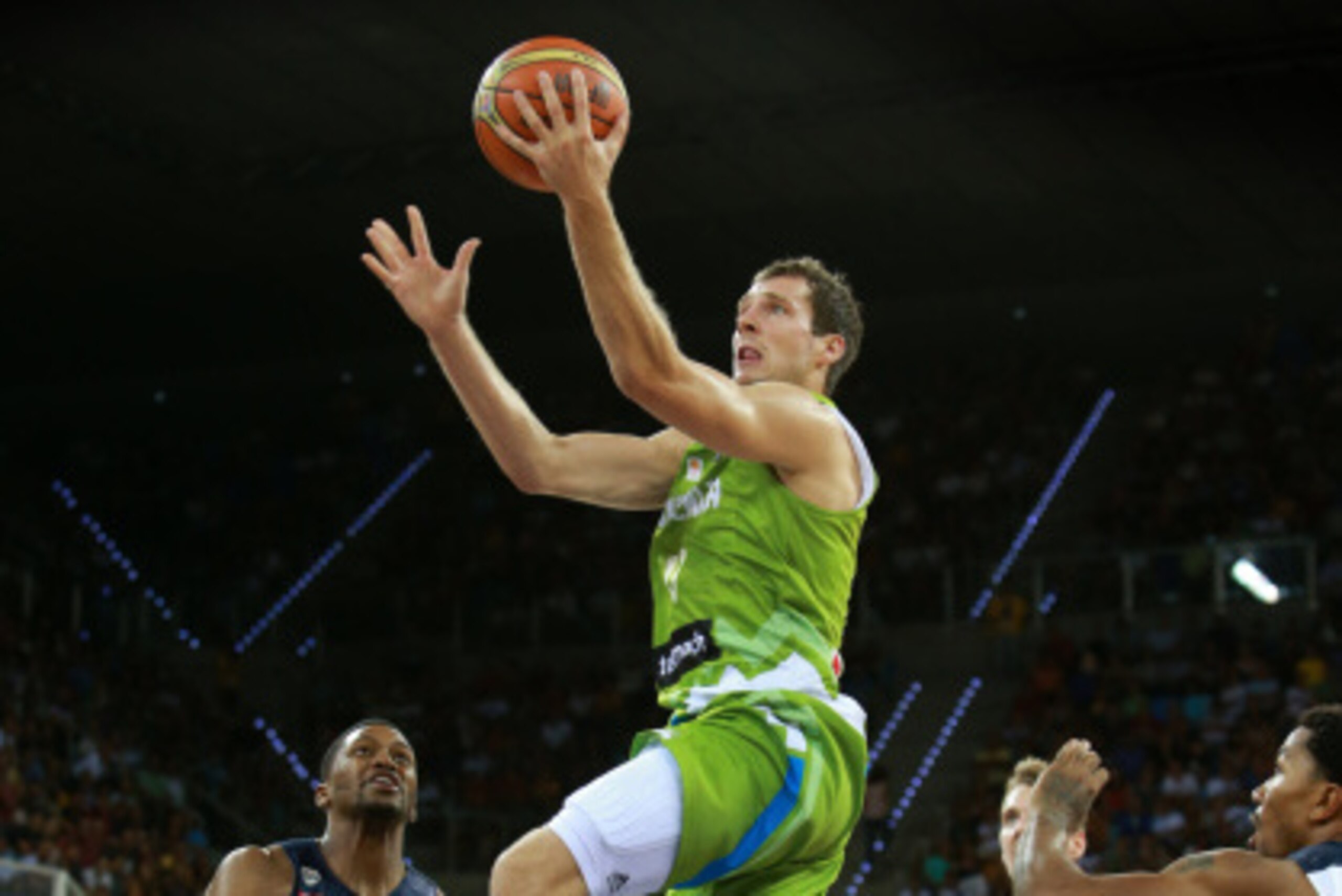 LAS PALMAS, GRAN CANARIA, SPAIN - AUGUST 26: Goran Dragic #11 of the Slovenia National Team shoots against Rudy Gay #8 of the USA Men's National Team on August 26, 2014 at Gran Canaria Arena in Las Palmas, Gran Canaria, Spain. NOTE TO USER: User expressly