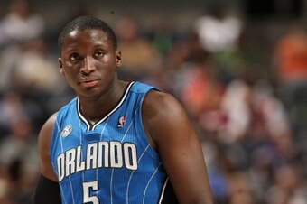 CHARLOTTE, NC - APRIL 4: Victor Oladipo #5 of the Orlando Magic looks on against the Charlotte Bobcats during the game at the Time Warner Cable Arena on April 4, 2014 in Charlotte, North Carolina. NOTE TO USER: User expressly acknowledges and agrees that,
