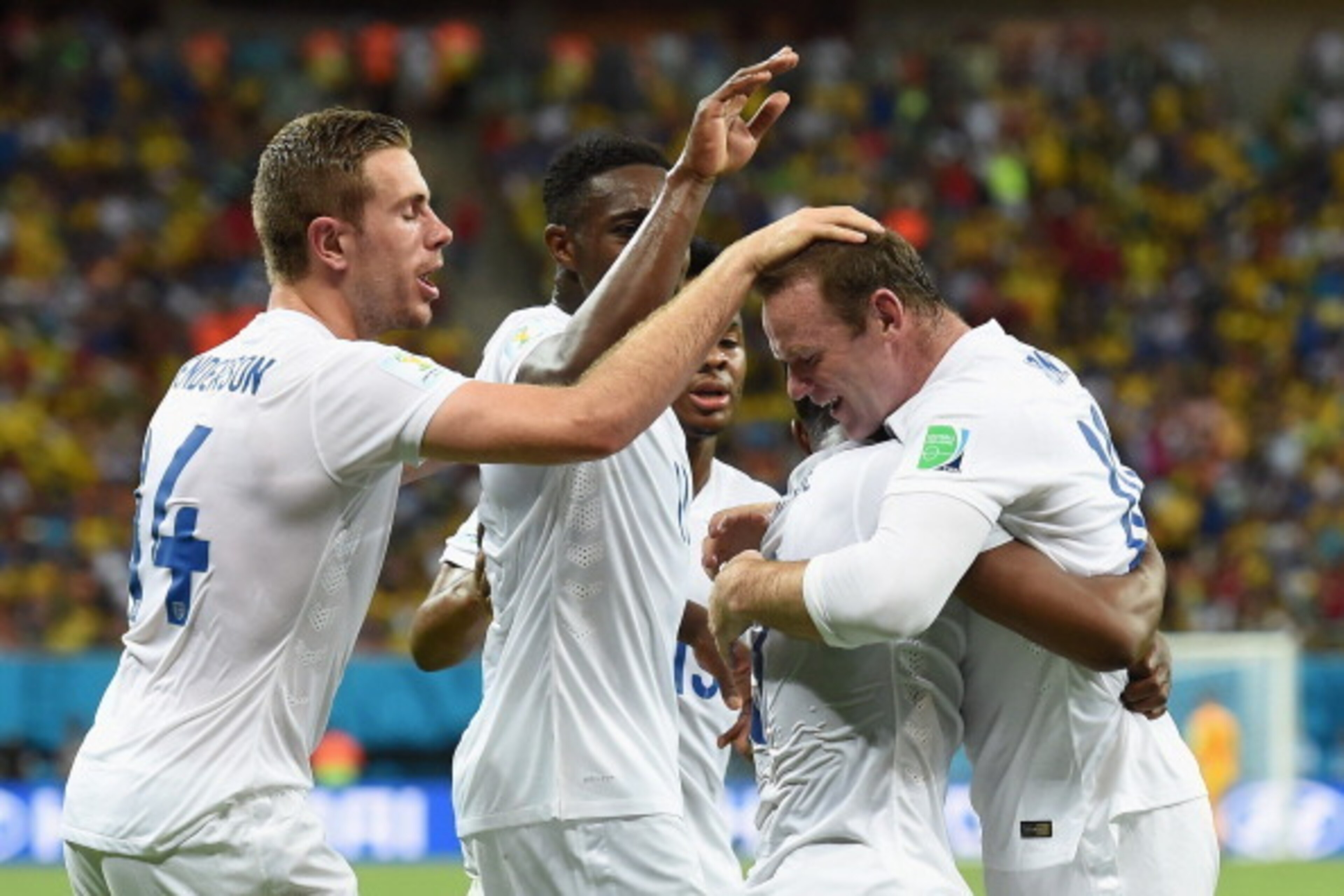 MANAUS, BRAZIL - JUNE 14:  Daniel Sturridge of England (2nd R) celebrates scoring his team's first goal with Jordan Henderson (L), Danny Welbeck (2nd L), Raheem Sterling (C) and Wayne Rooney (R) during the 2014 FIFA World Cup Brazil Group D match between 
