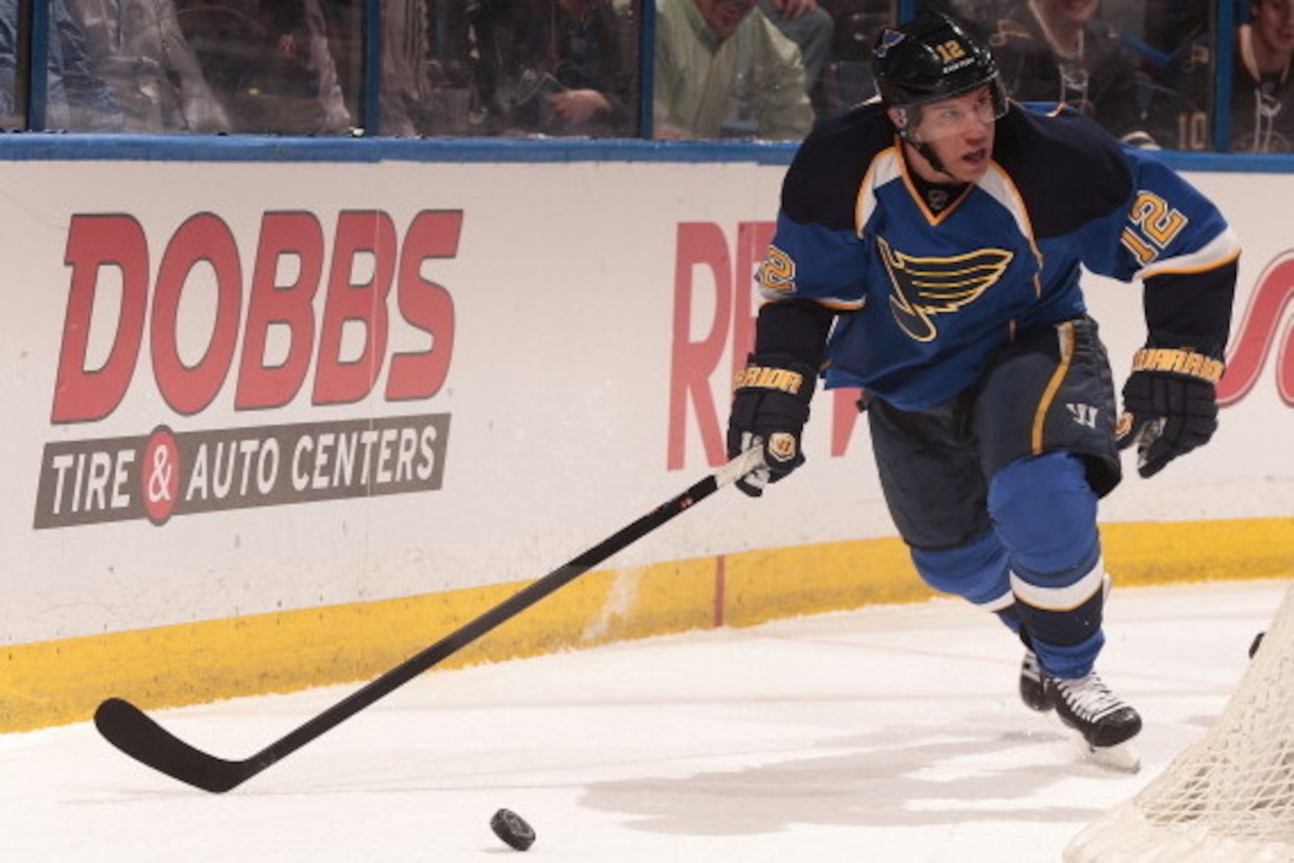 ST. LOUIS, MO - APRIL 08: Derek Roy #12 of the St. Louis Blues handles the puck against the Washington Capitals during an NHL game on April 8, 2014 at Scottrade Center in St. Louis, Missouri. (Photo by Mark Buckner/NHLI via Getty Images)